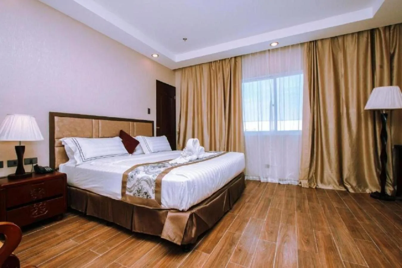 Bed in Palawan Uno Hotel