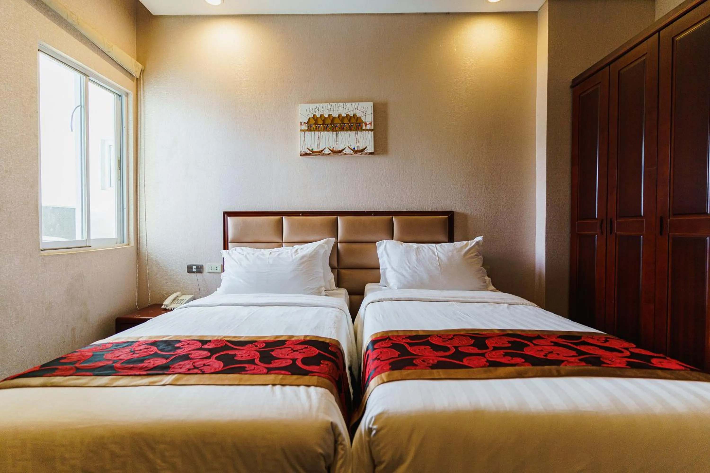 Bed in Palawan Uno Hotel