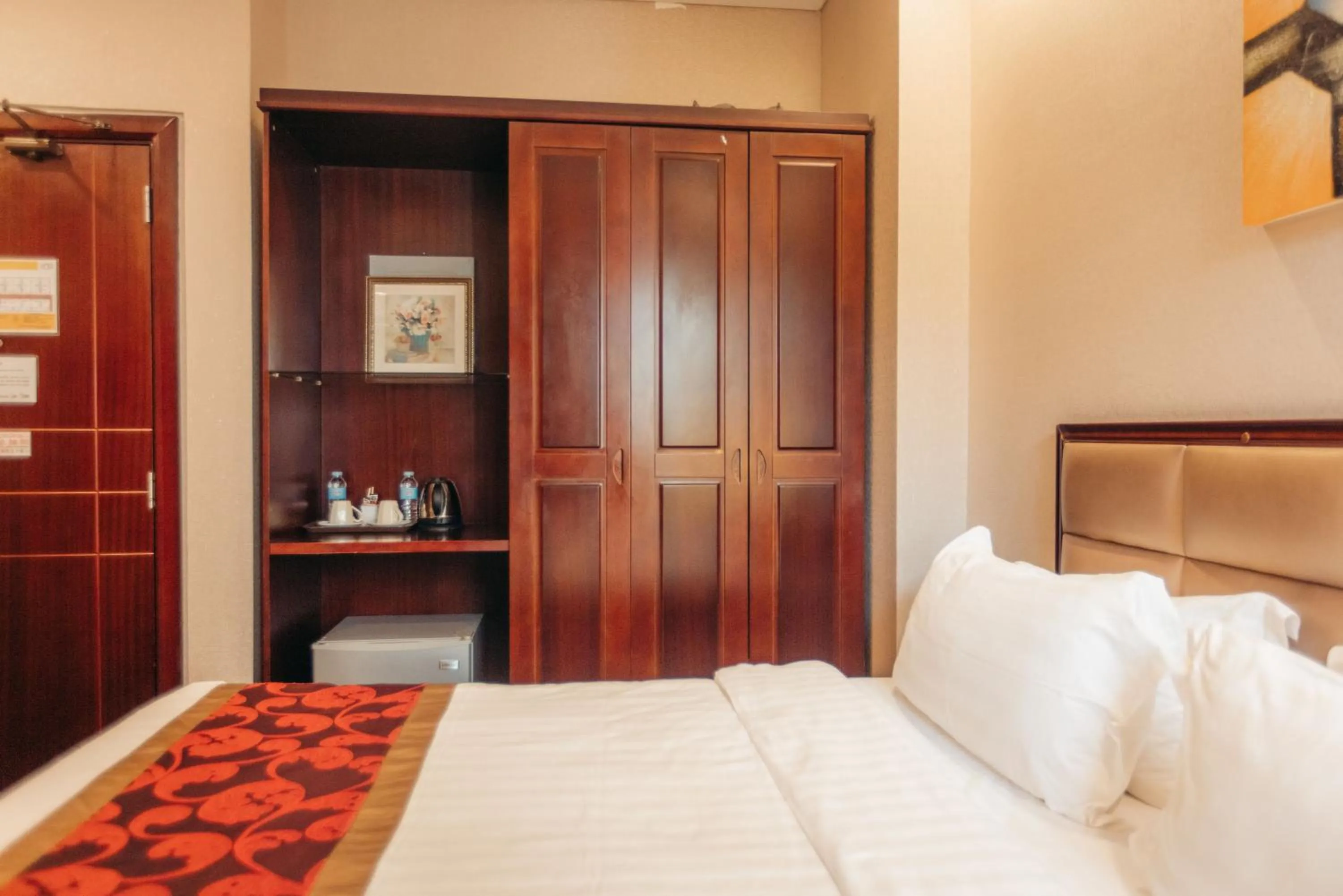 Bed in Palawan Uno Hotel