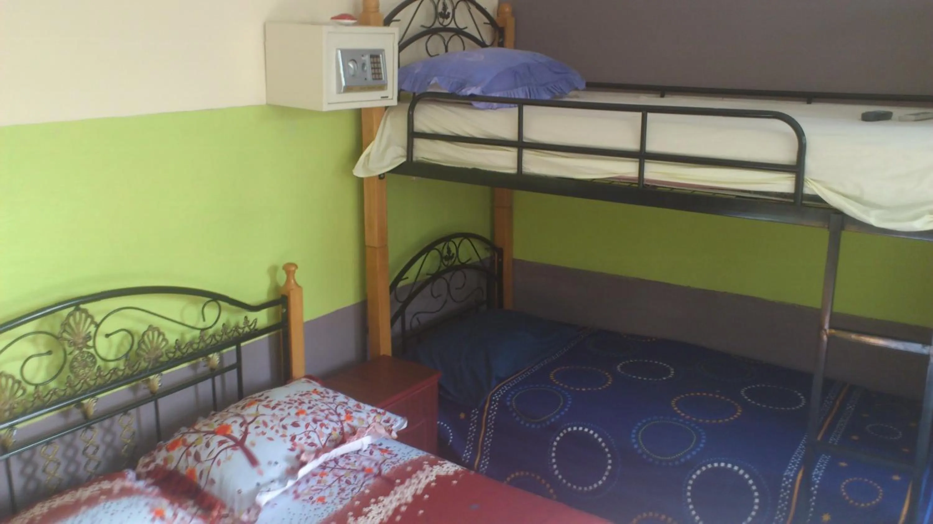 Bed in Tyvabro Guesthouse