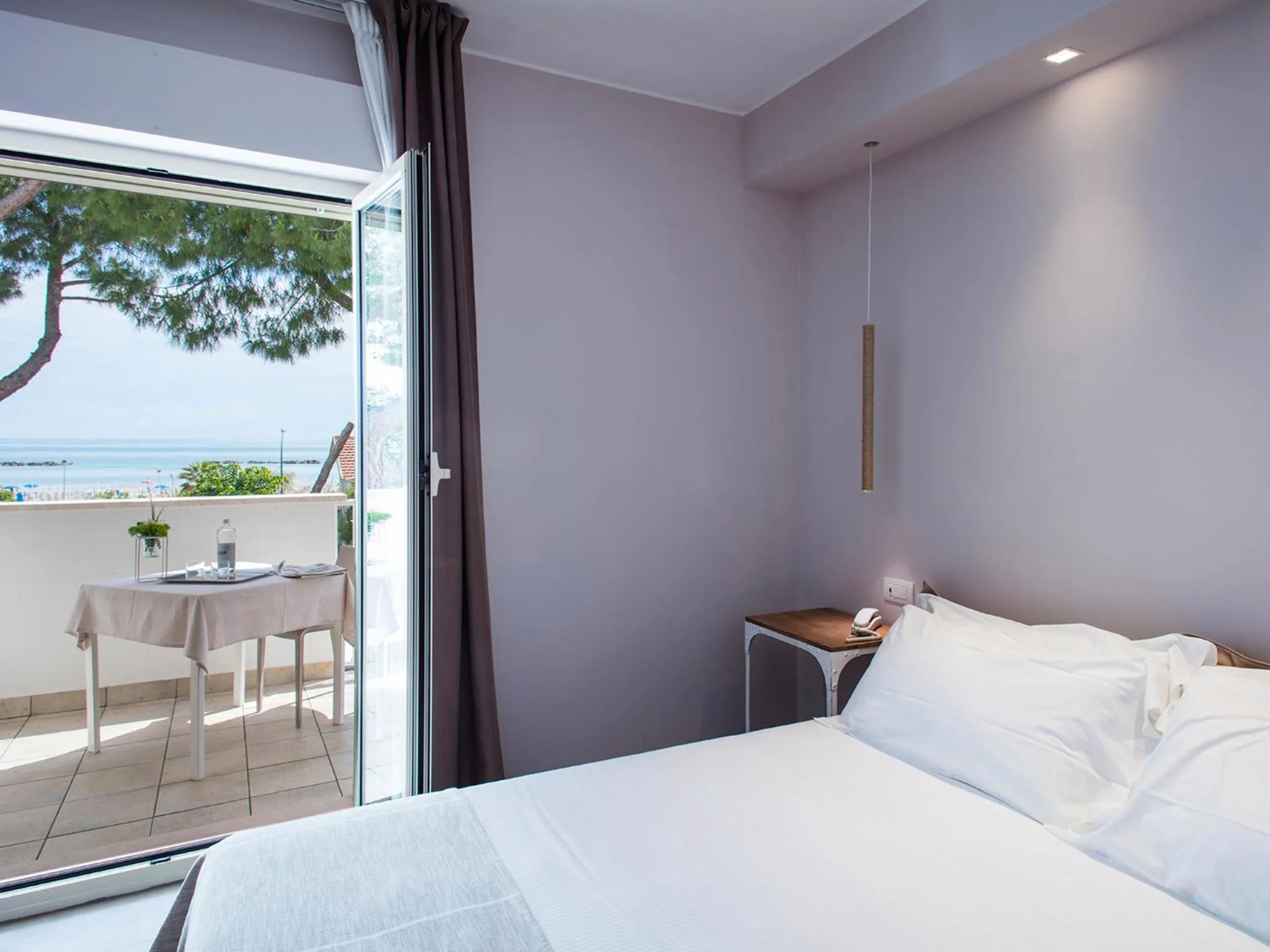 Balcony/Terrace, Bed in Manè Boutique Hotel