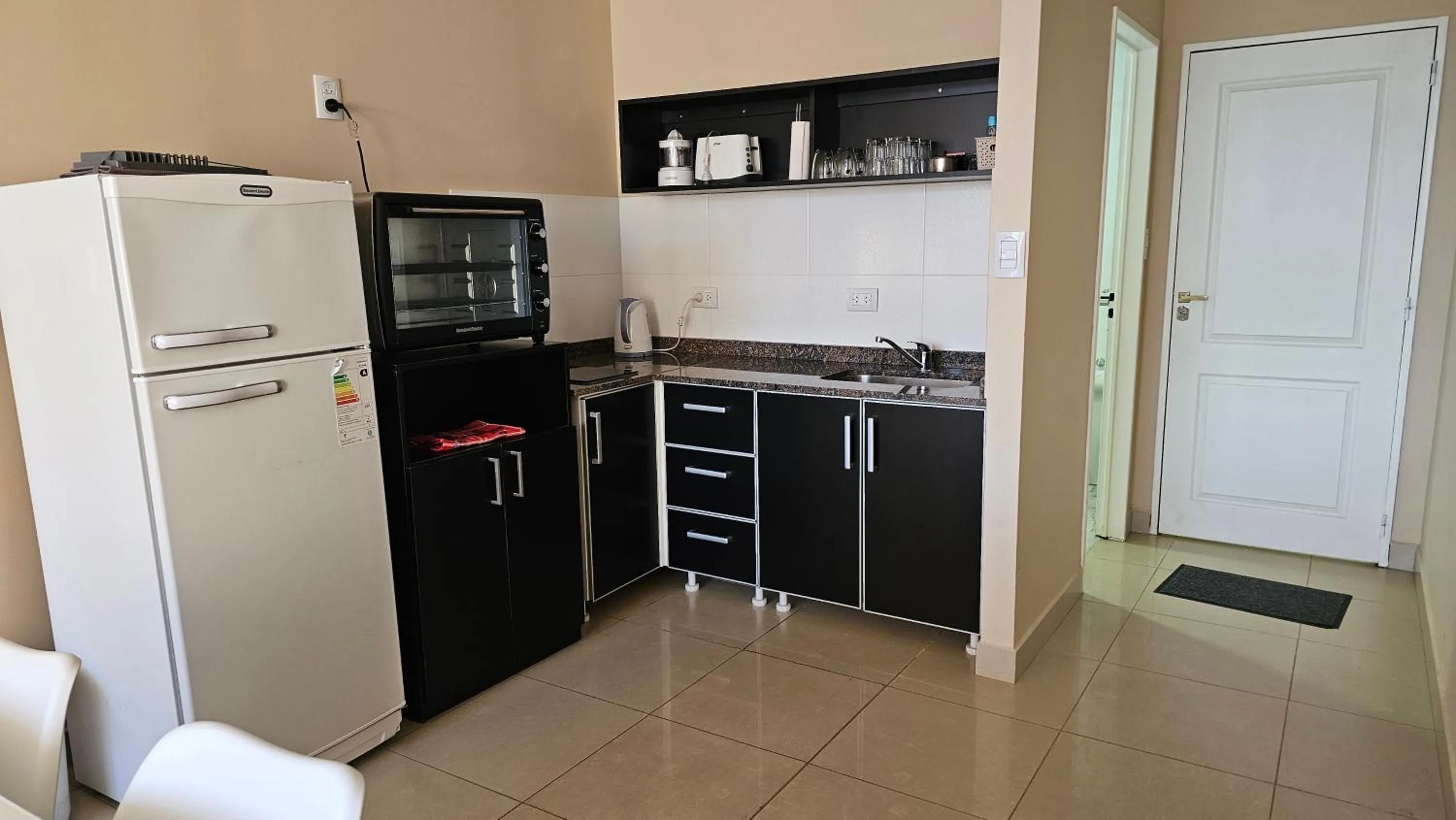 Kitchen or kitchenette in CONDOR Patagonia Aparts