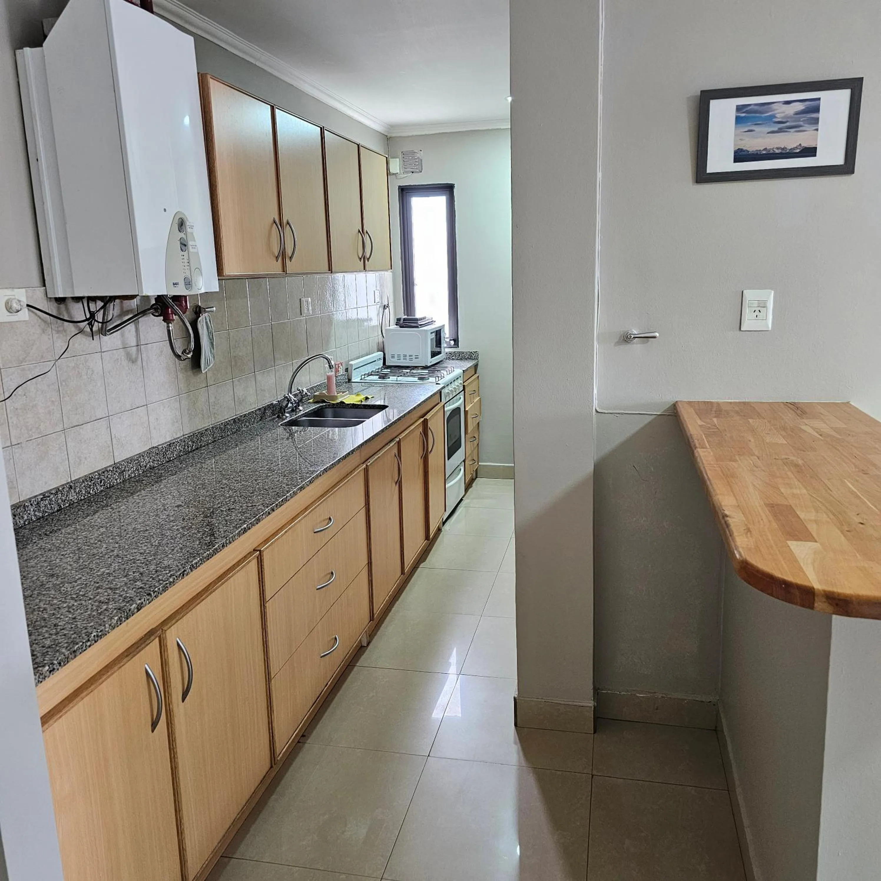 Kitchen or kitchenette in CONDOR Patagonia Aparts