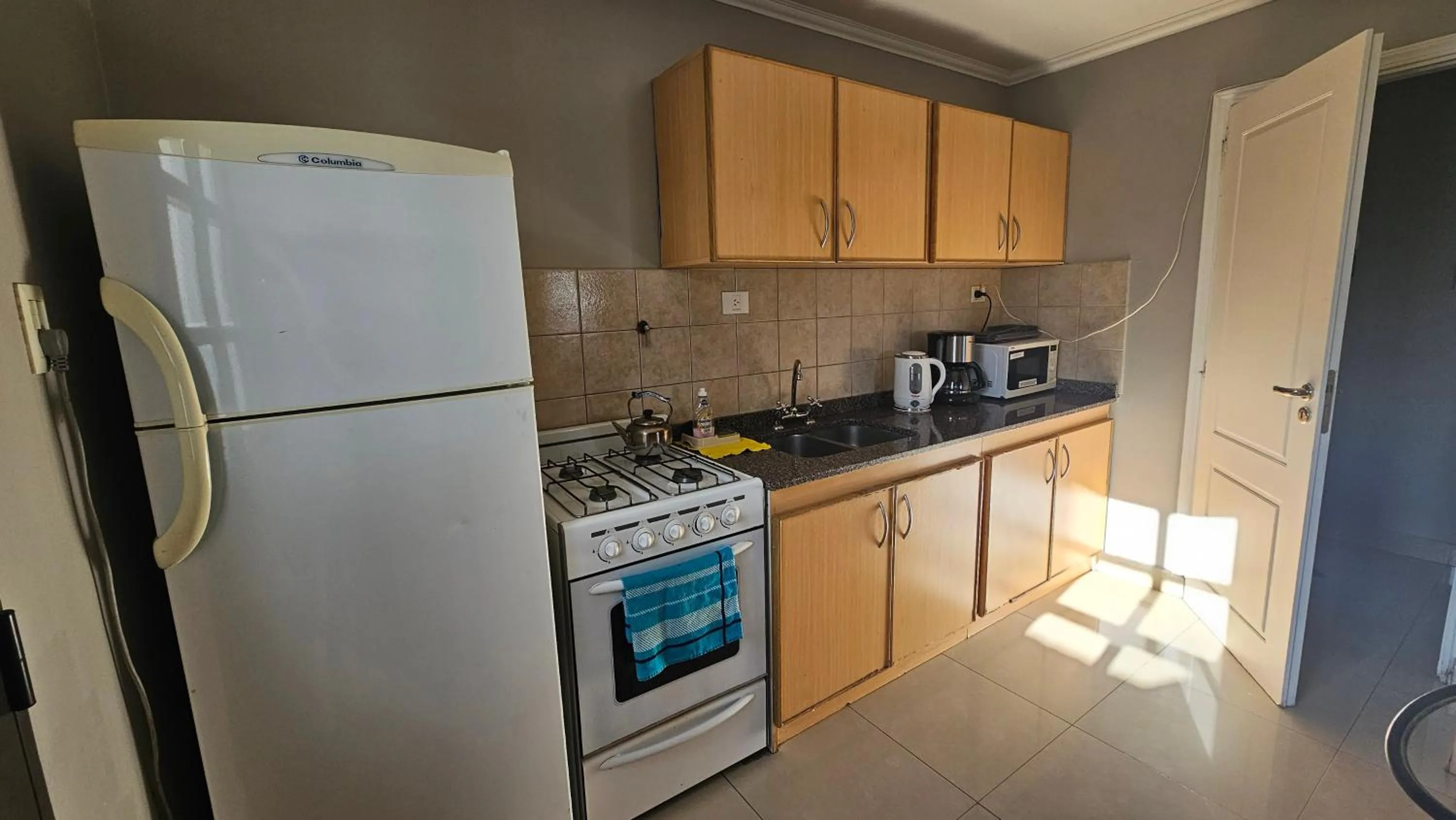 Kitchen or kitchenette in CONDOR Patagonia Aparts