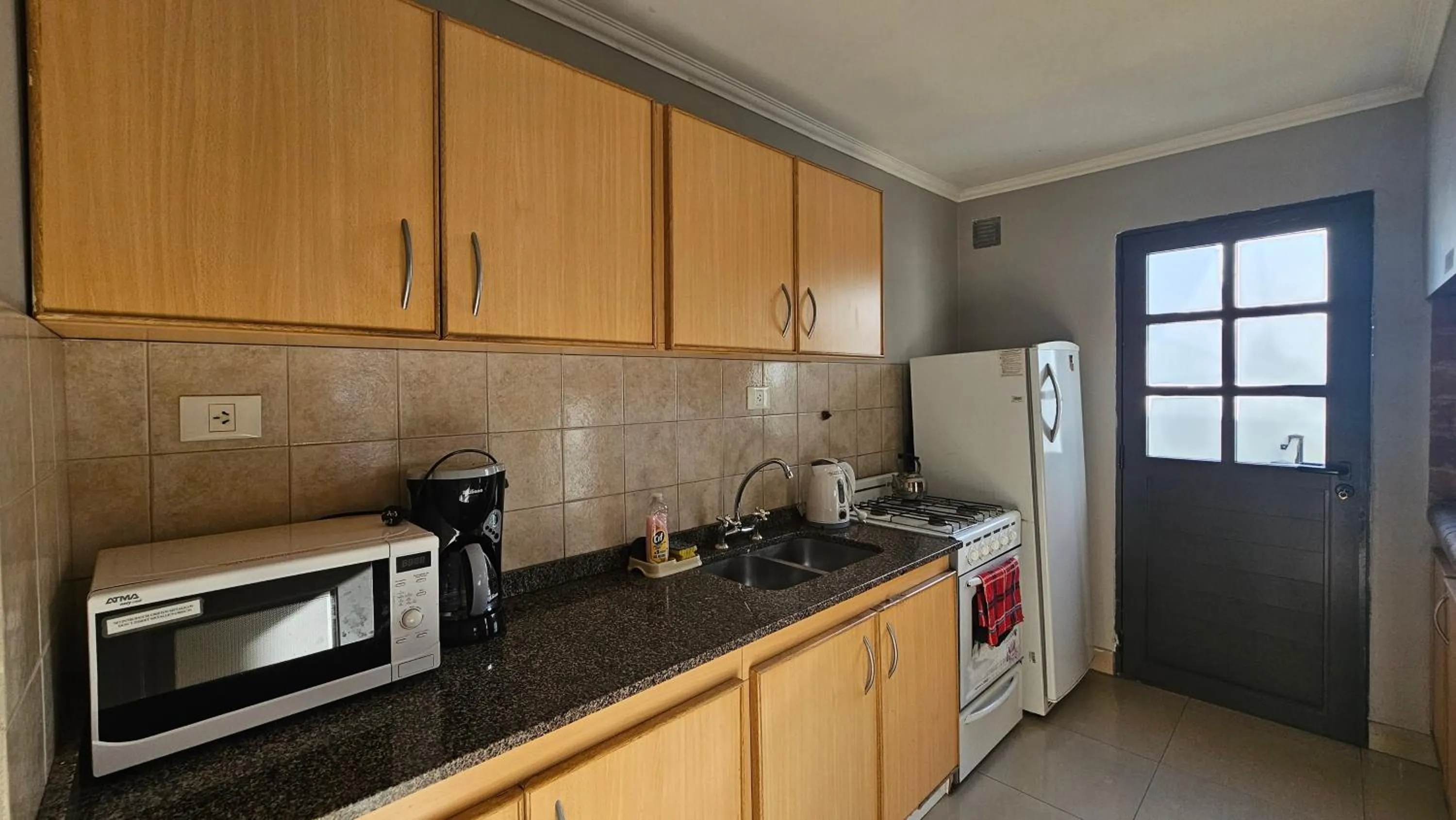 Kitchen or kitchenette in CONDOR Patagonia Aparts