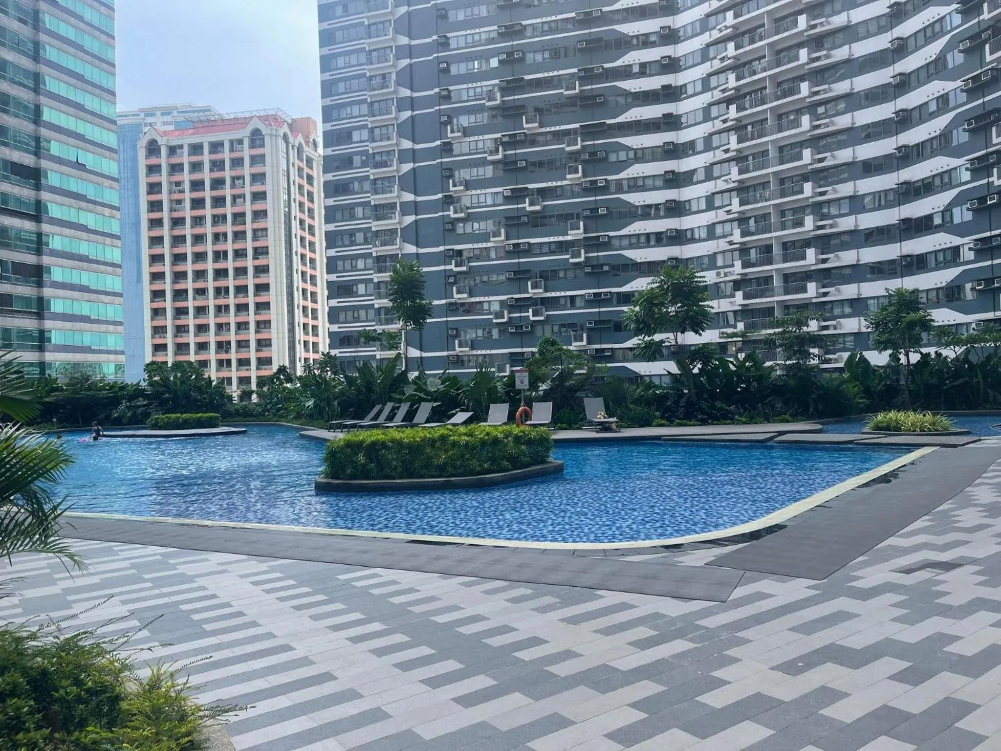 Swimming pool in E & T Homecations 2 Bedroom Apartment at SMDC Air Residences
