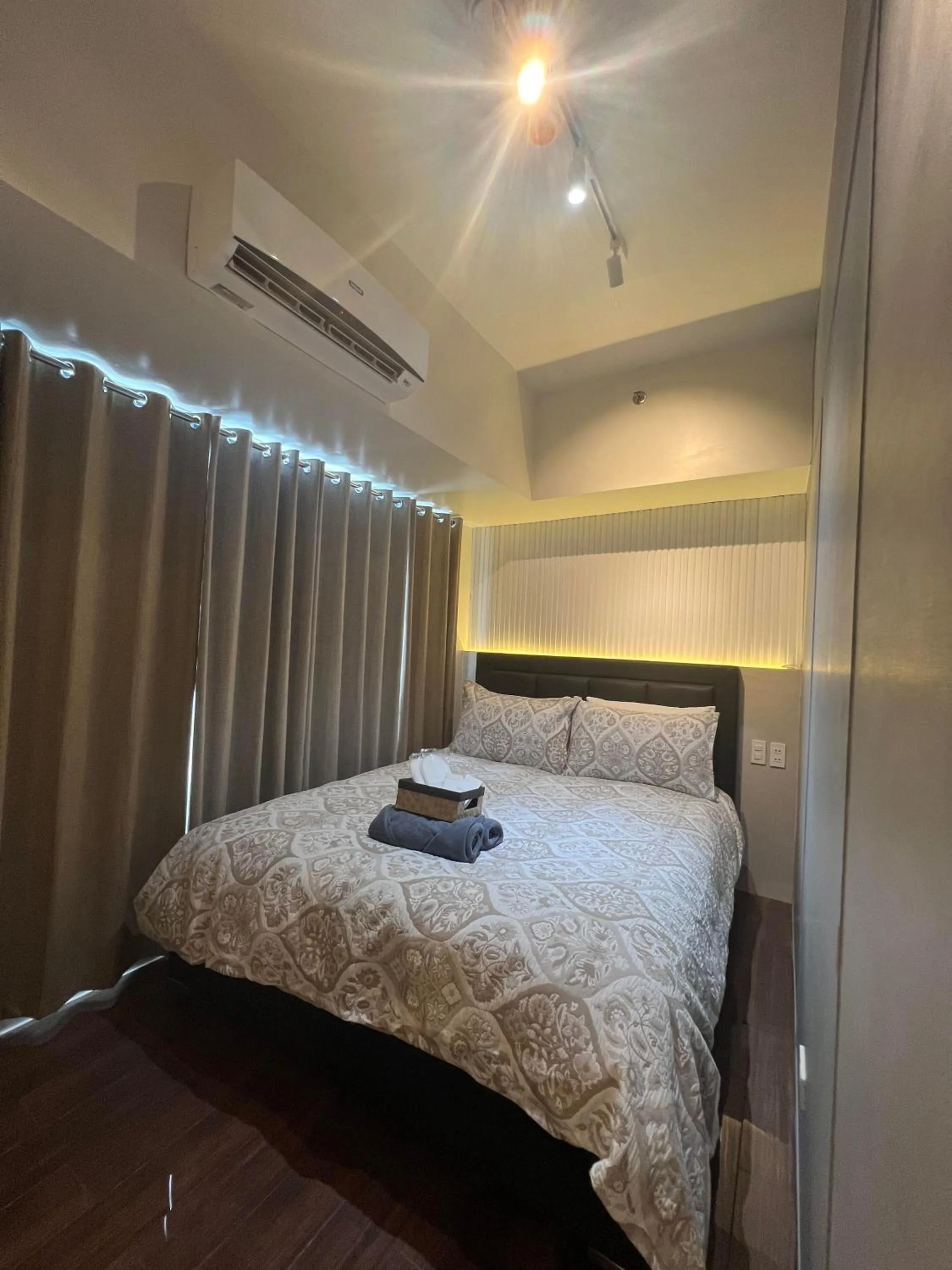 Bedroom, Bed in E & T Homecations 2 Bedroom Apartment at SMDC Air Residences