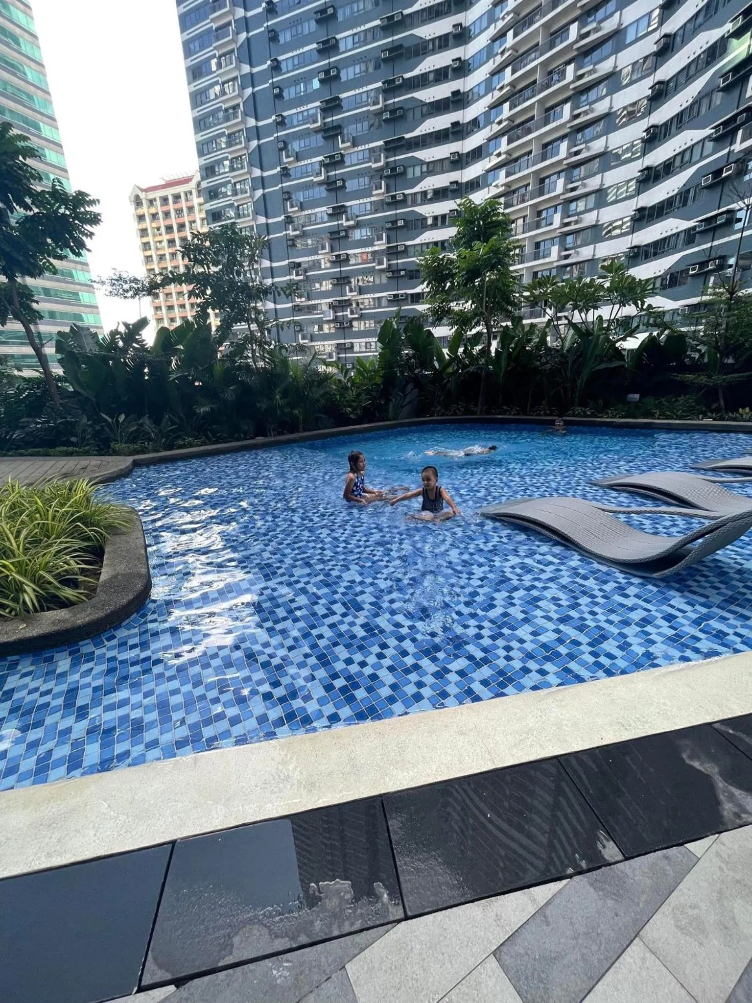 Swimming pool in E & T Homecations 2 Bedroom Apartment at SMDC Air Residences