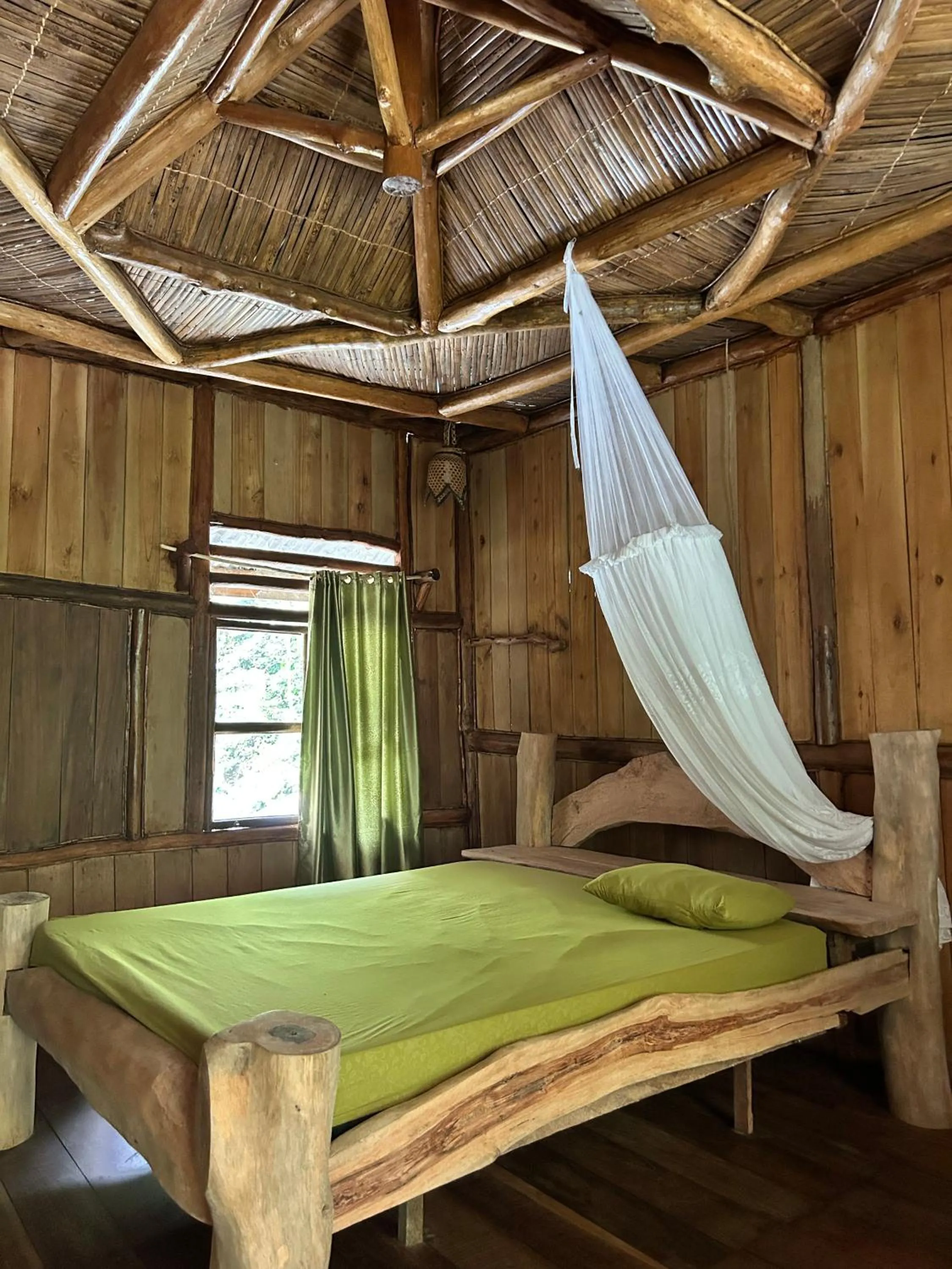 Bed in Back to Nature Ecotourism
