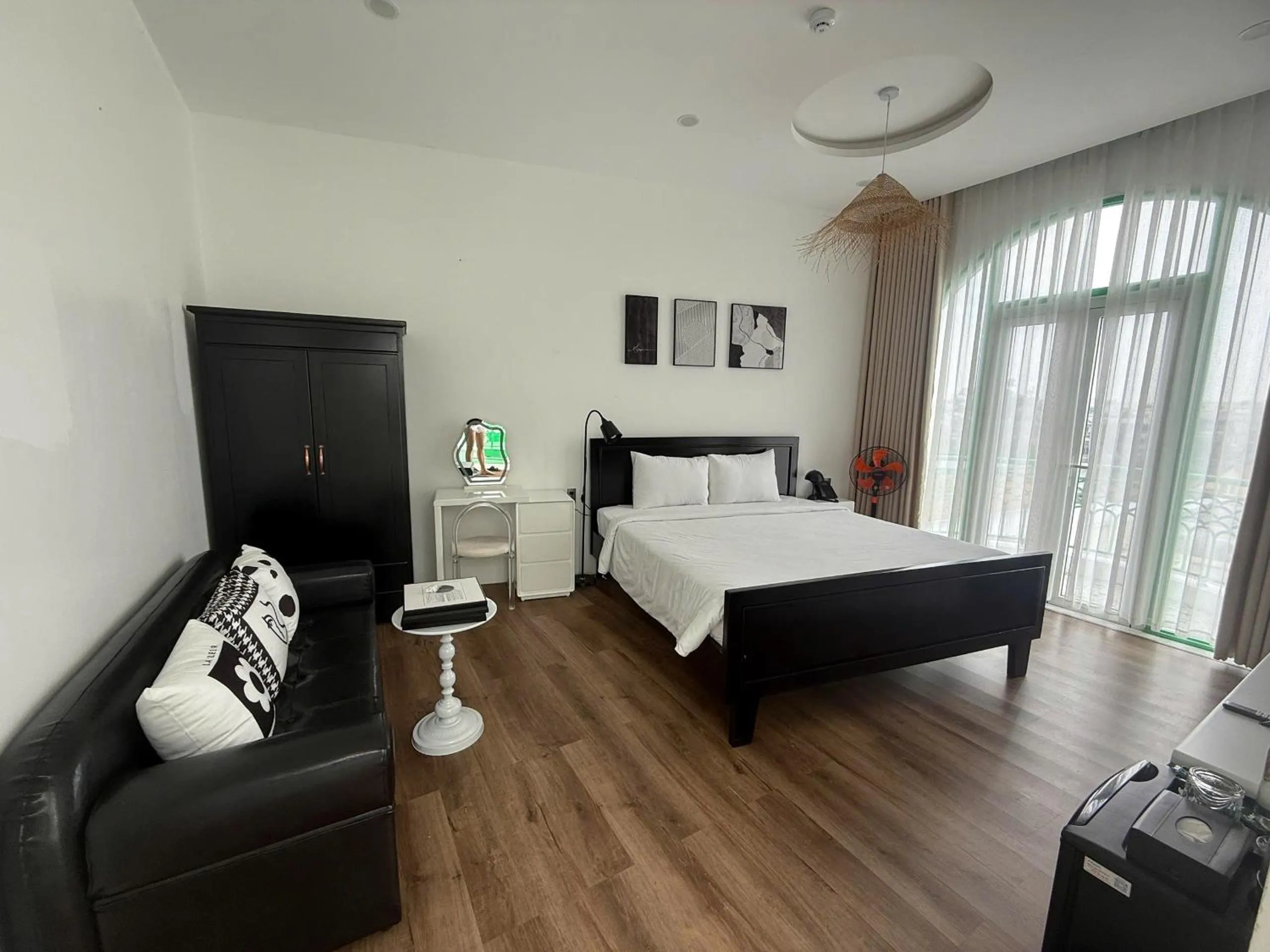 Photo of the whole room, Bed in Pisces Hotel Hue