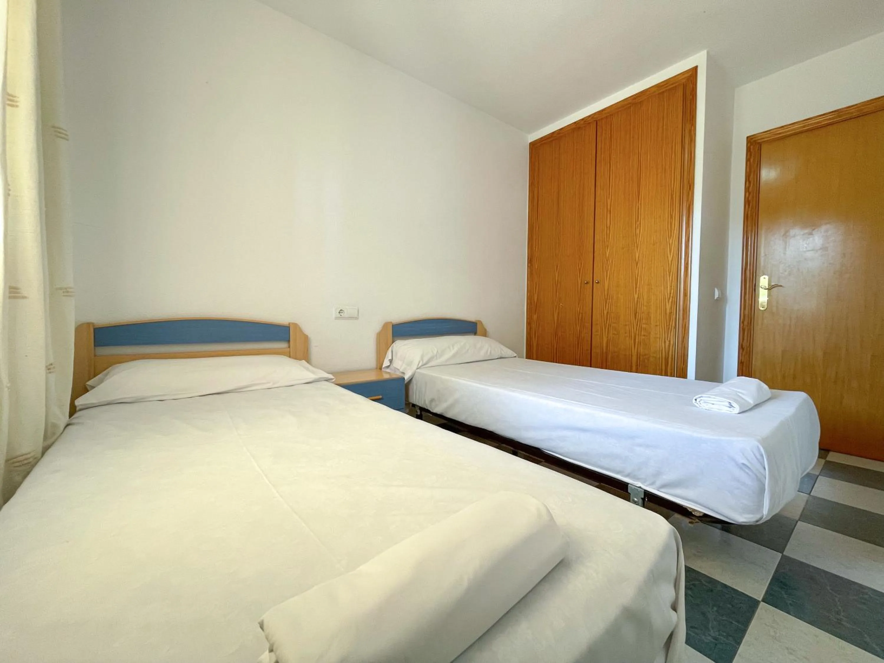 Bed in Apartamentos Bonaire 3000