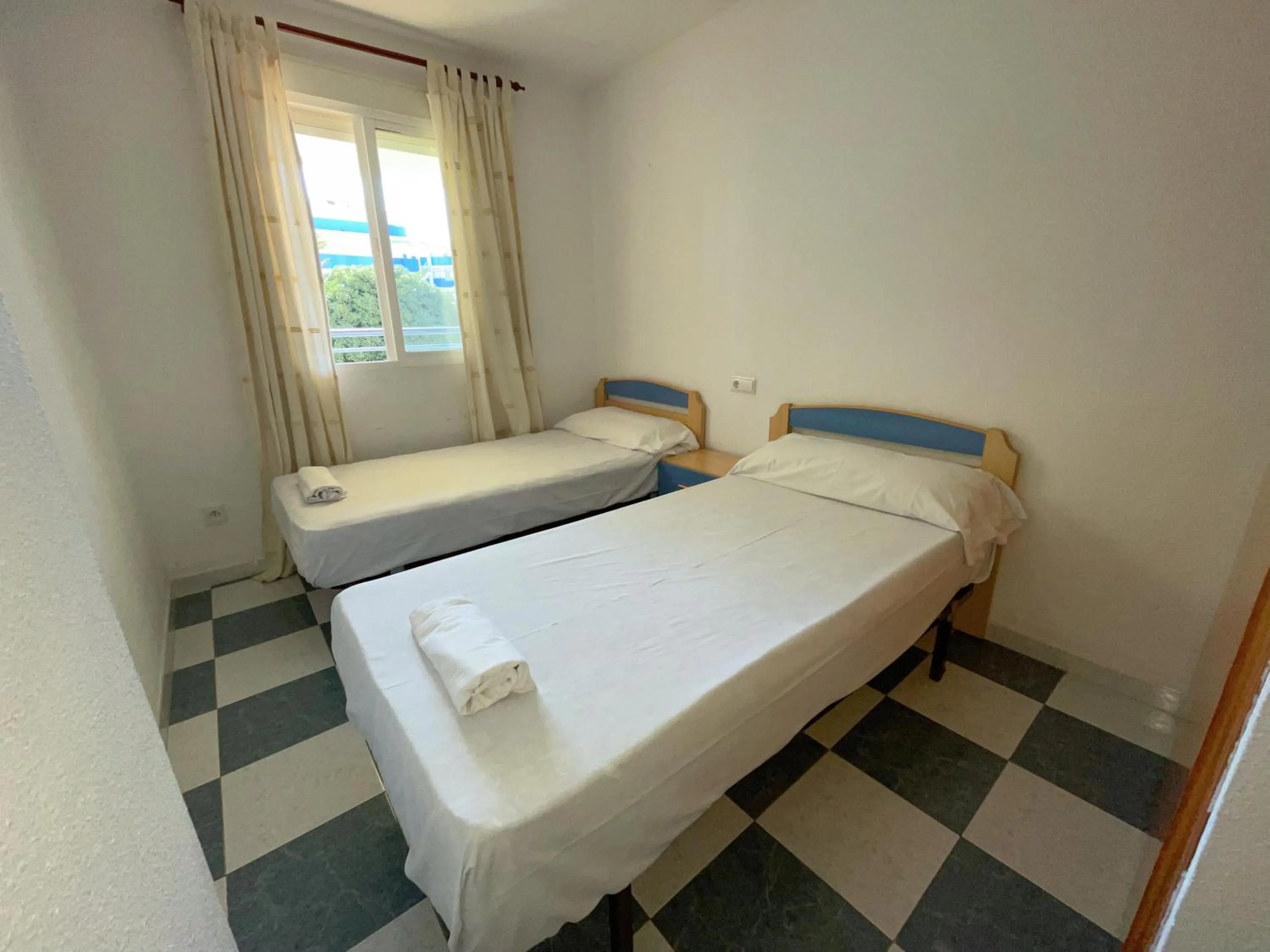 Bed in Apartamentos Bonaire 3000