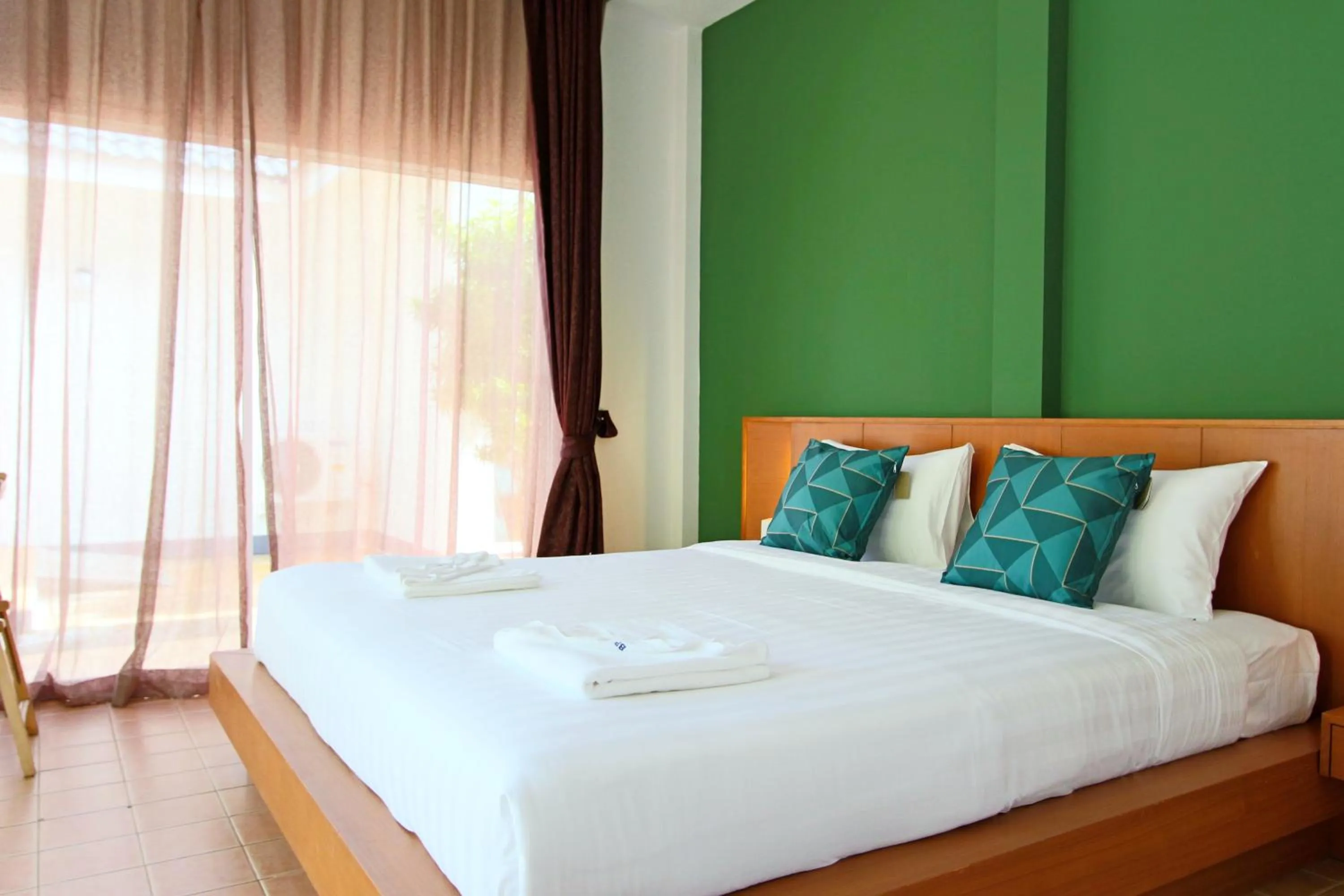 Bed in Blue Palm Kata Resort