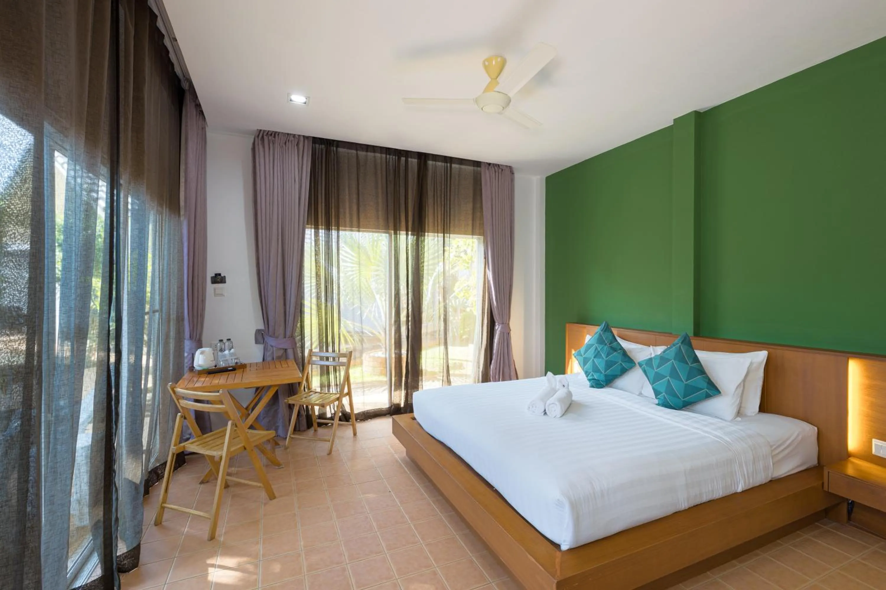 Bed in Blue Palm Kata Resort