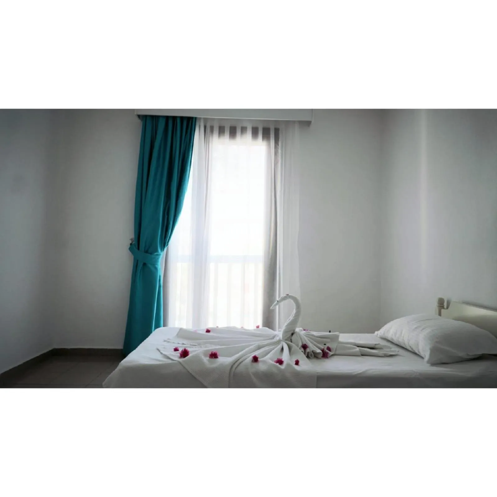 Bed in Gumbet Cove Hotel