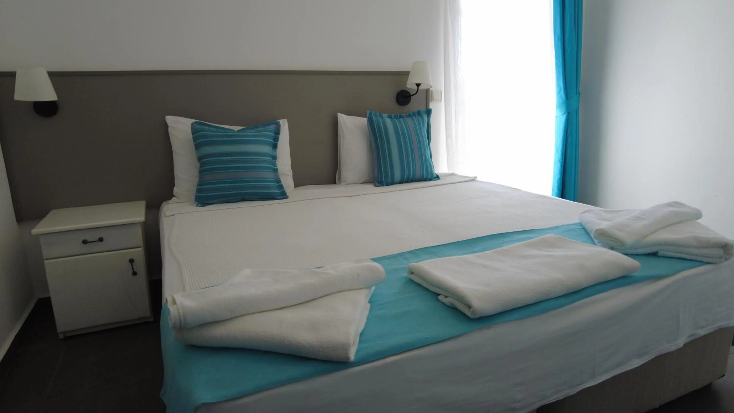 Bed in Gumbet Cove Hotel