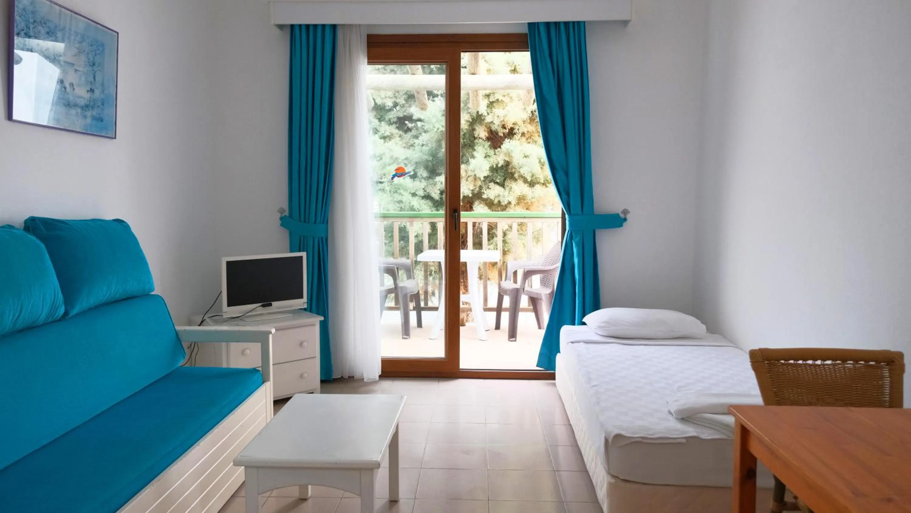 Bed in Gumbet Cove Hotel