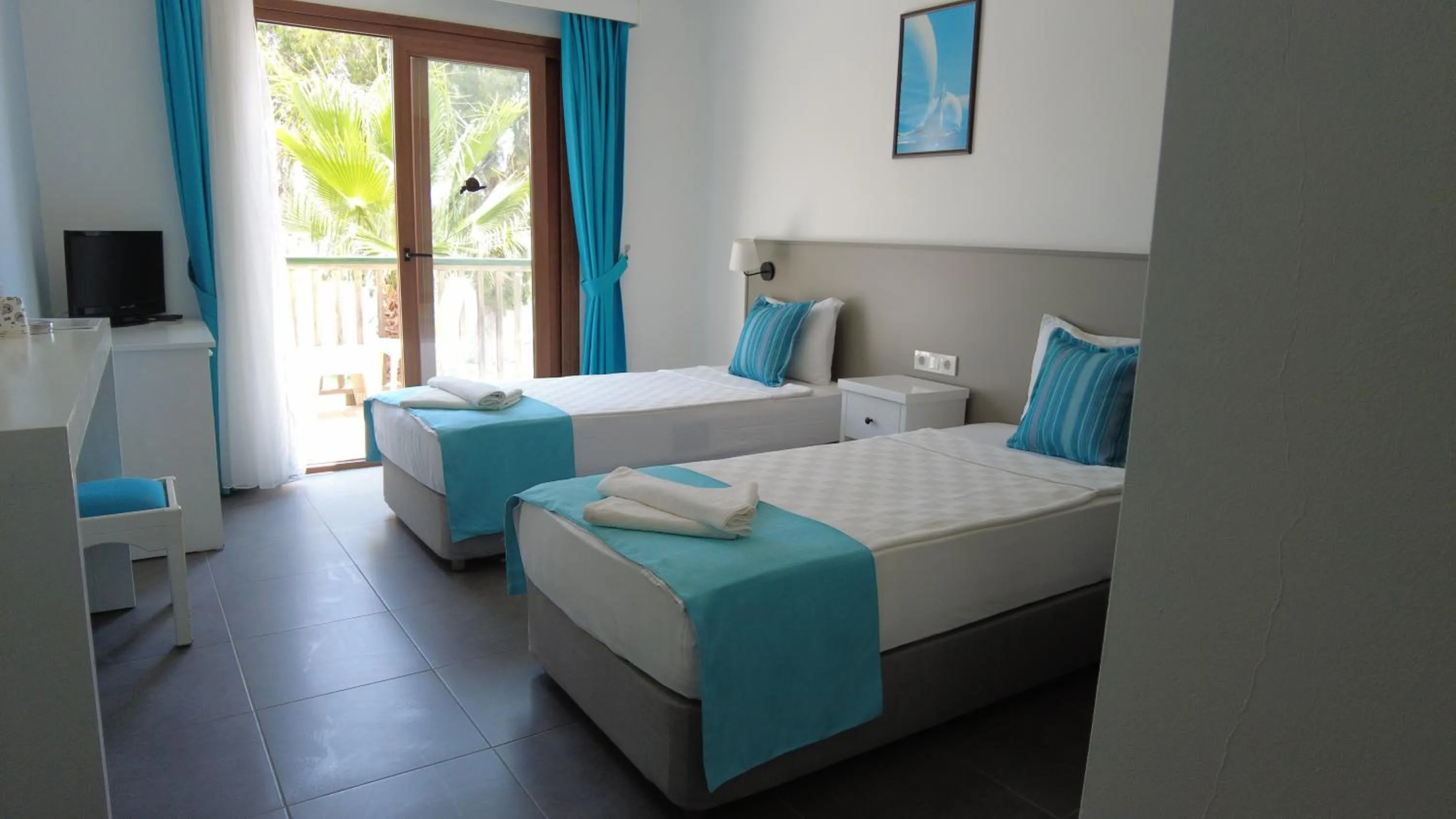Bed in Gumbet Cove Hotel