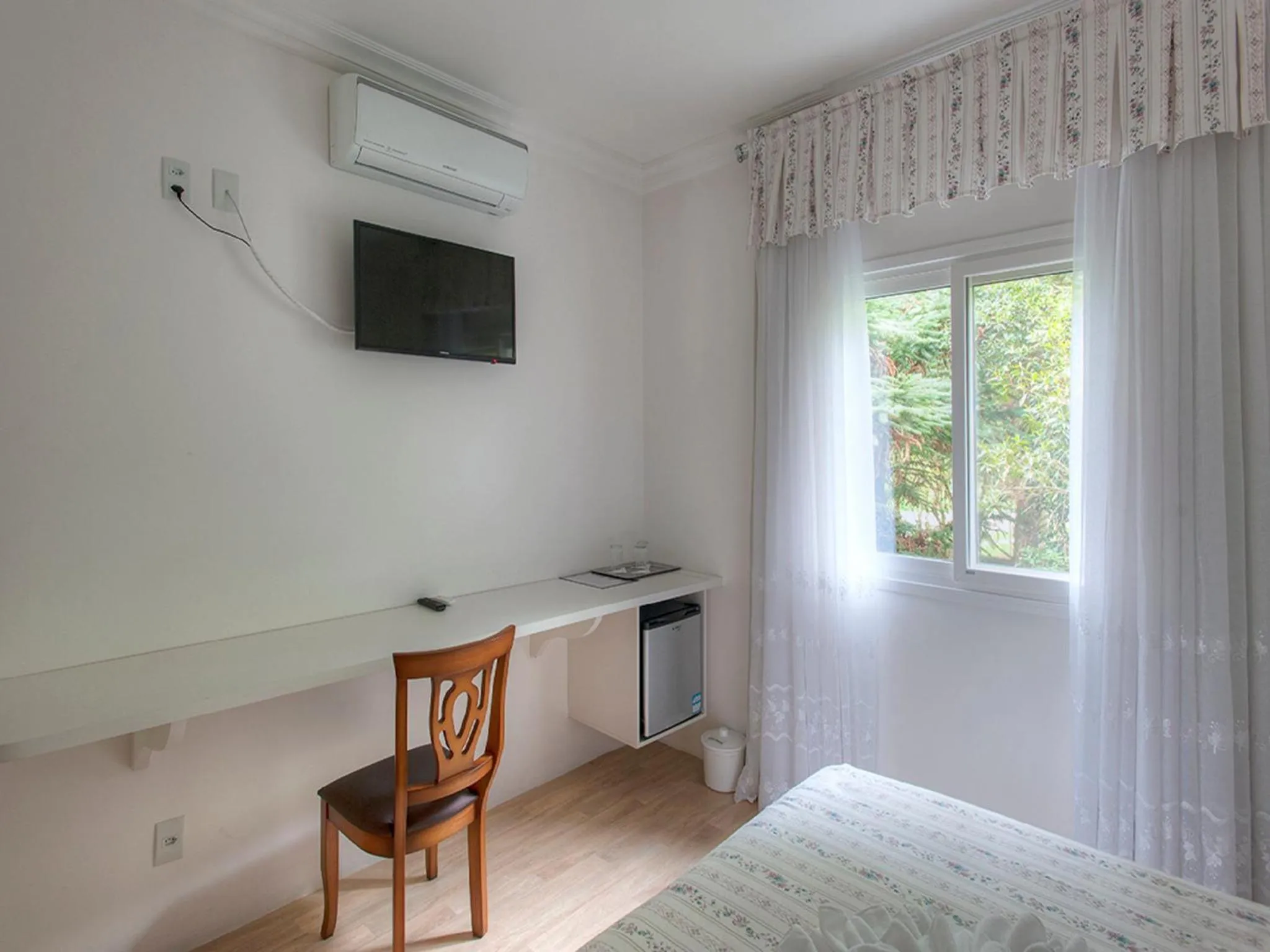 Photo of the whole room, Bed in Pousada Perfume de Canela
