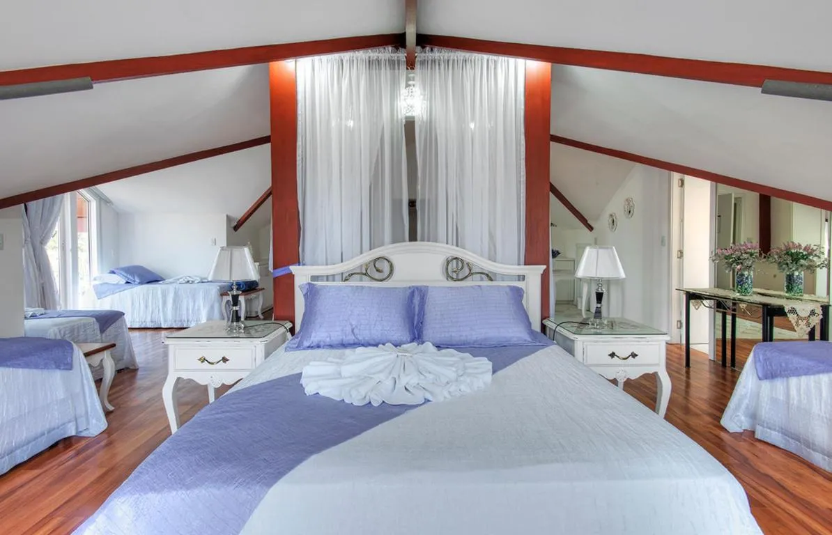 Photo of the whole room, Bed in Pousada Perfume de Canela