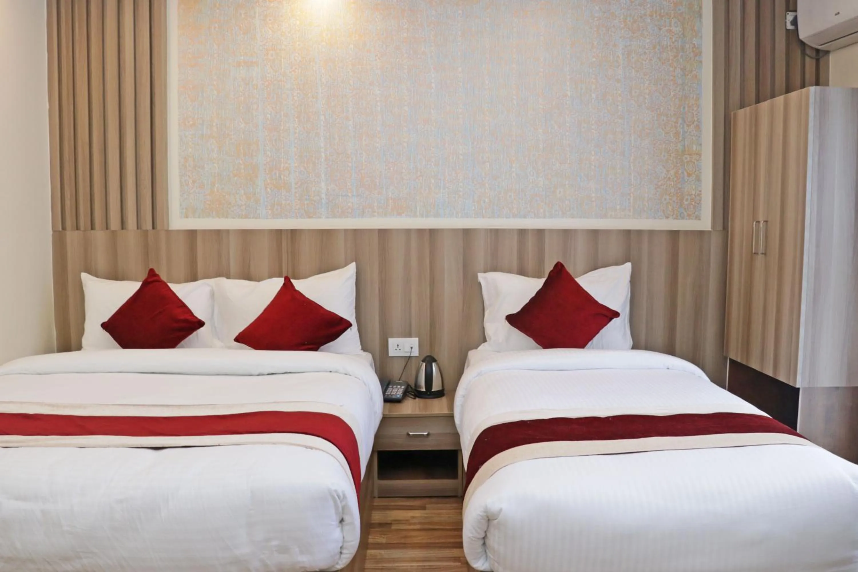 Bed in Hotel Royal Emperor