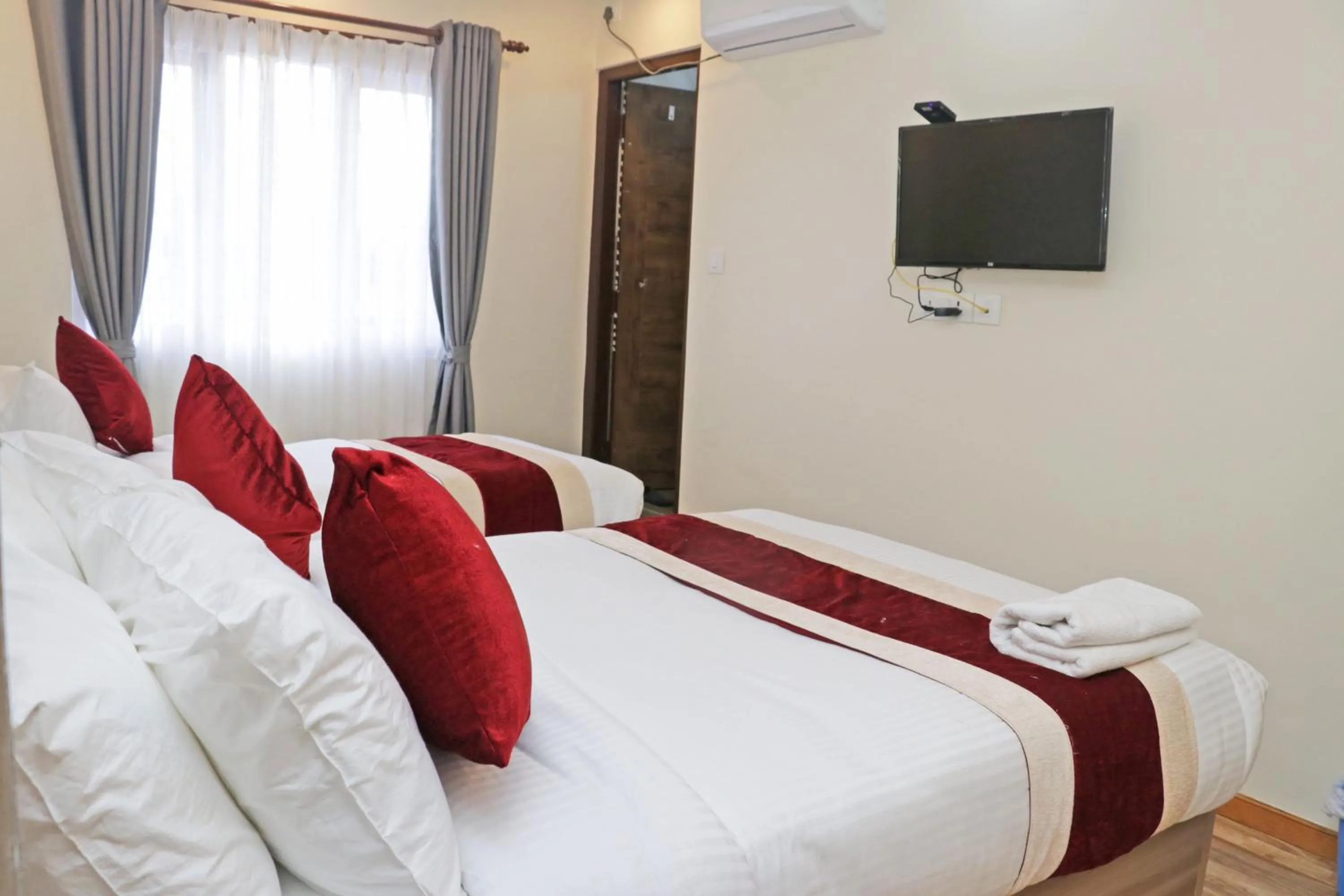 Bed in Hotel Royal Emperor