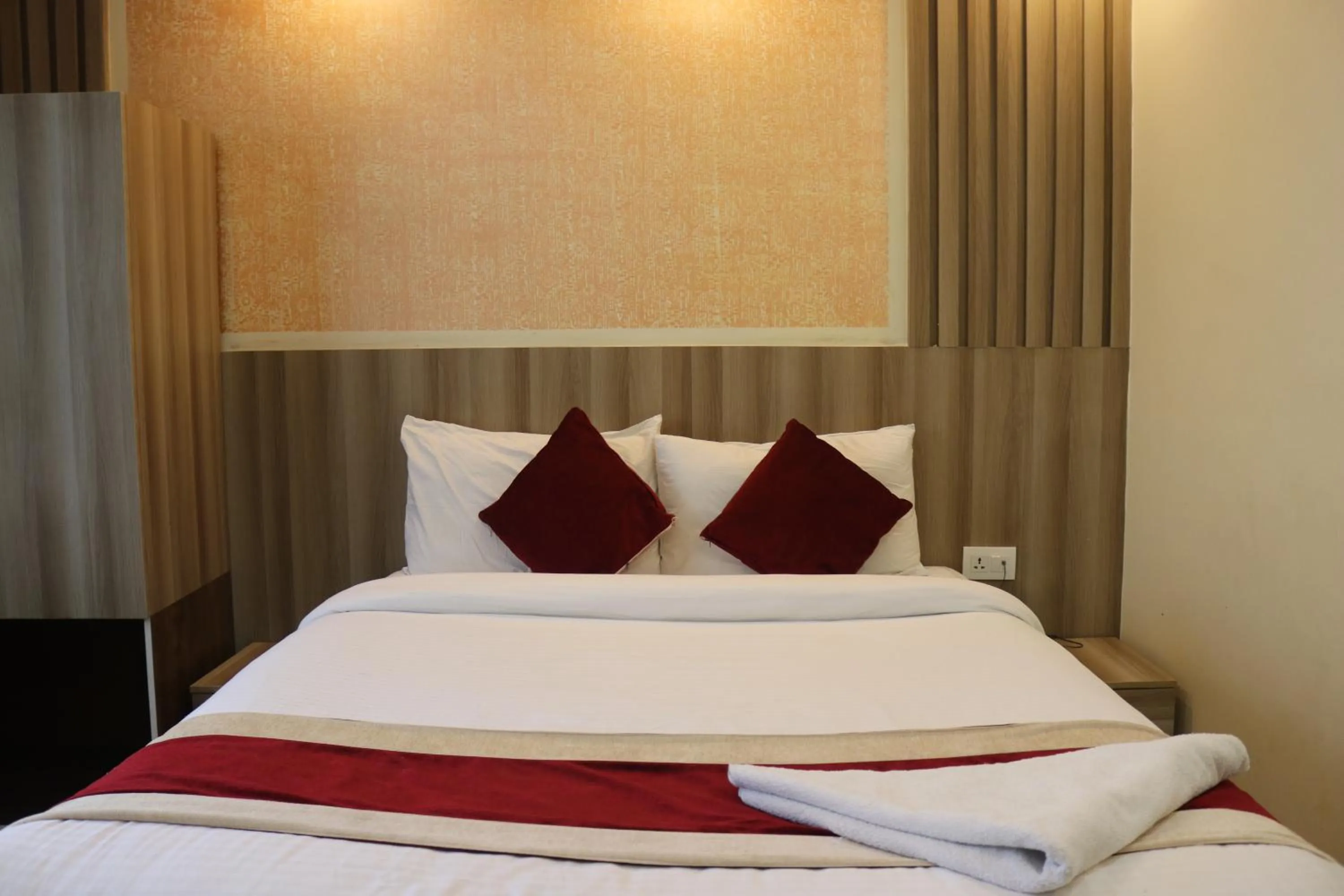 Bed in Hotel Royal Emperor