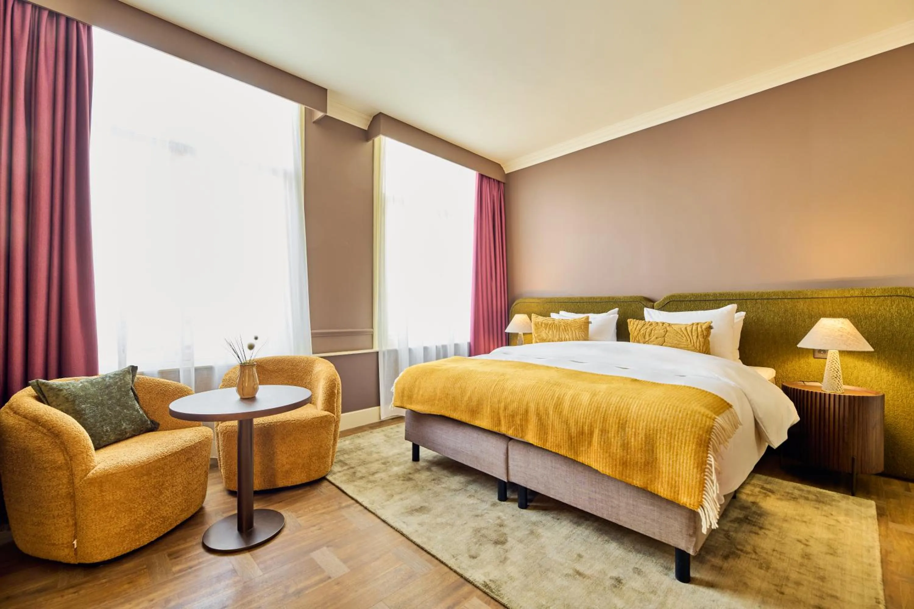 Bed in ARQ Paleis Hotel