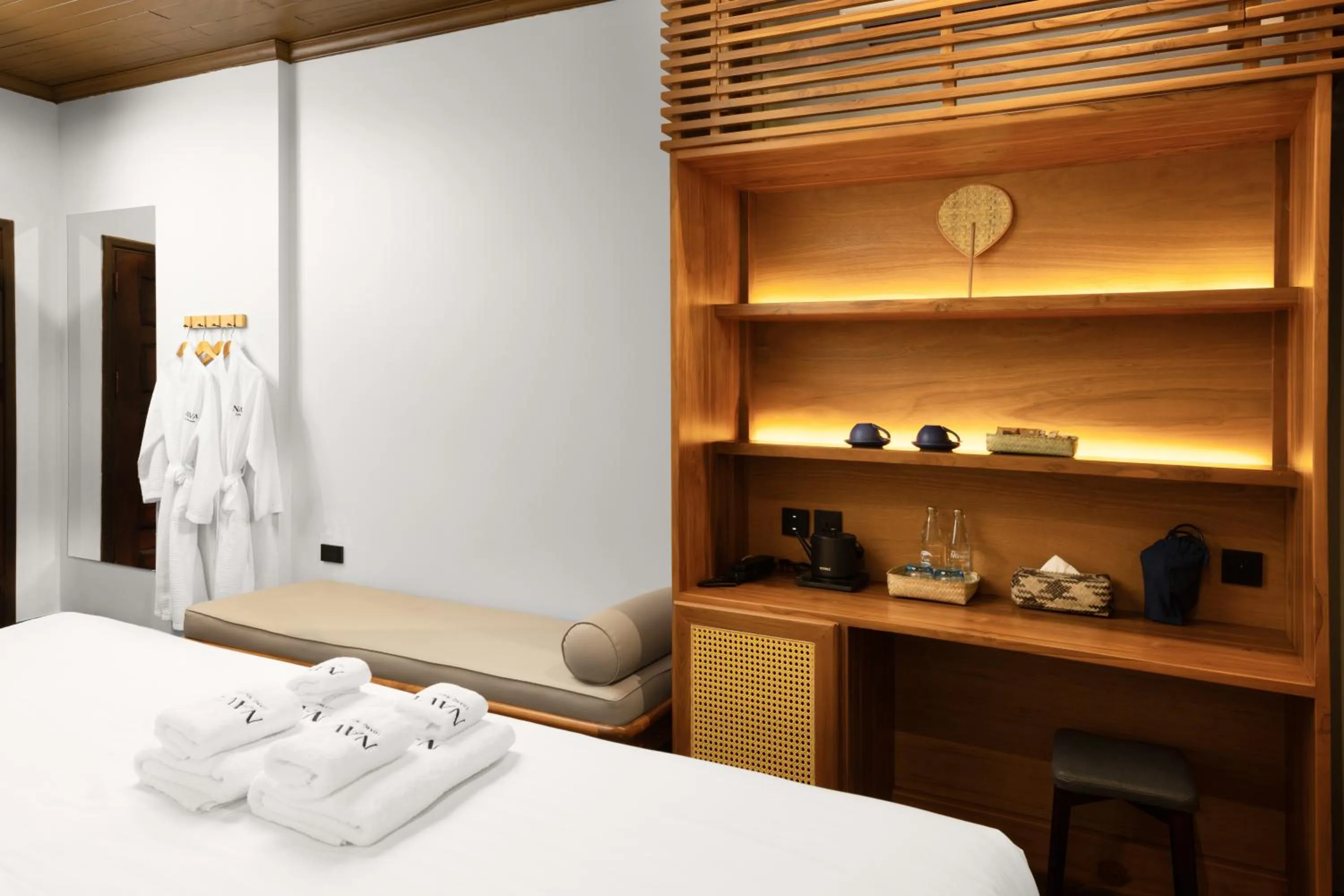 Bed in Nava Luang Prabang Hotel