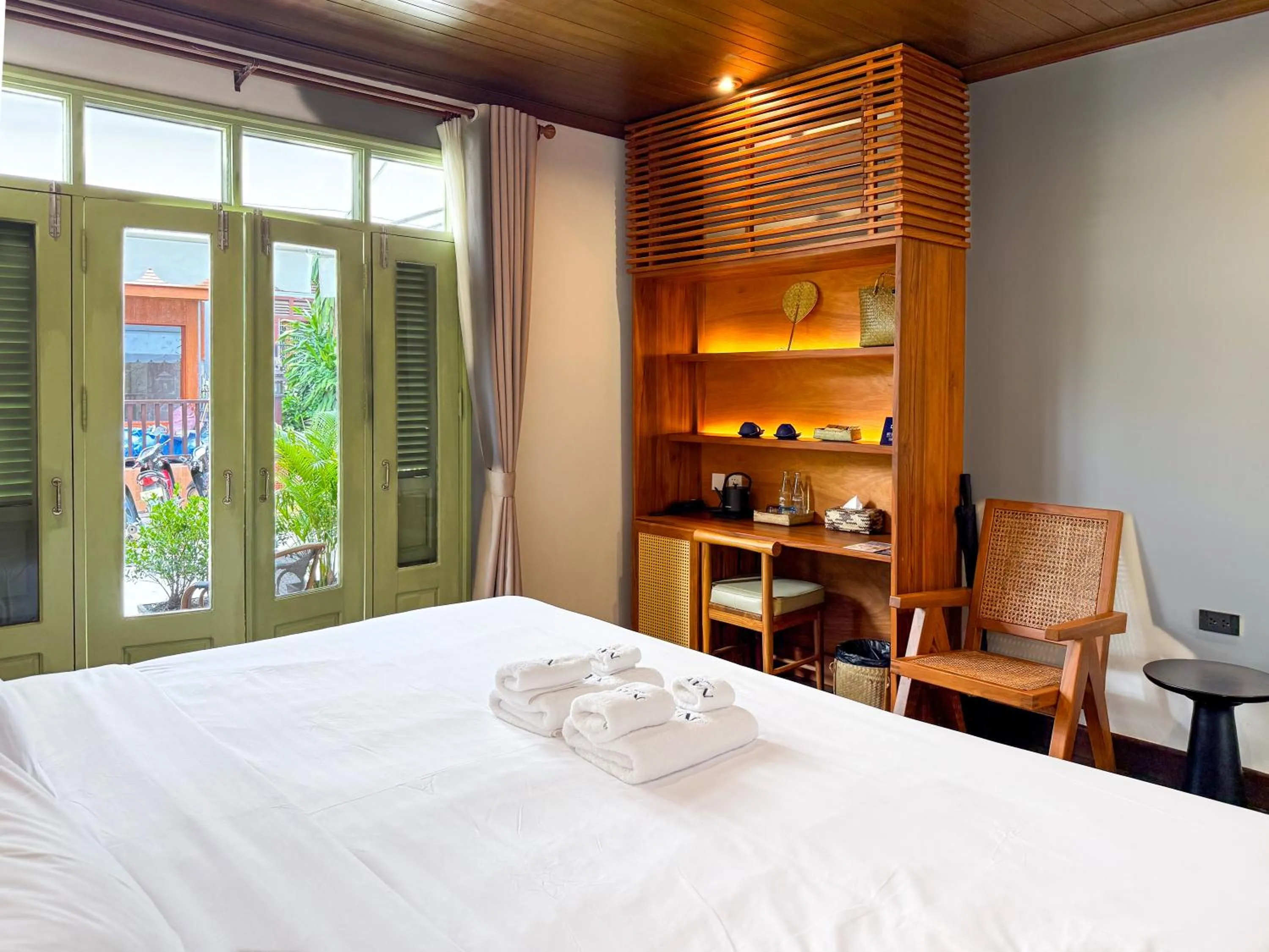 Bed in Nava Luang Prabang Hotel