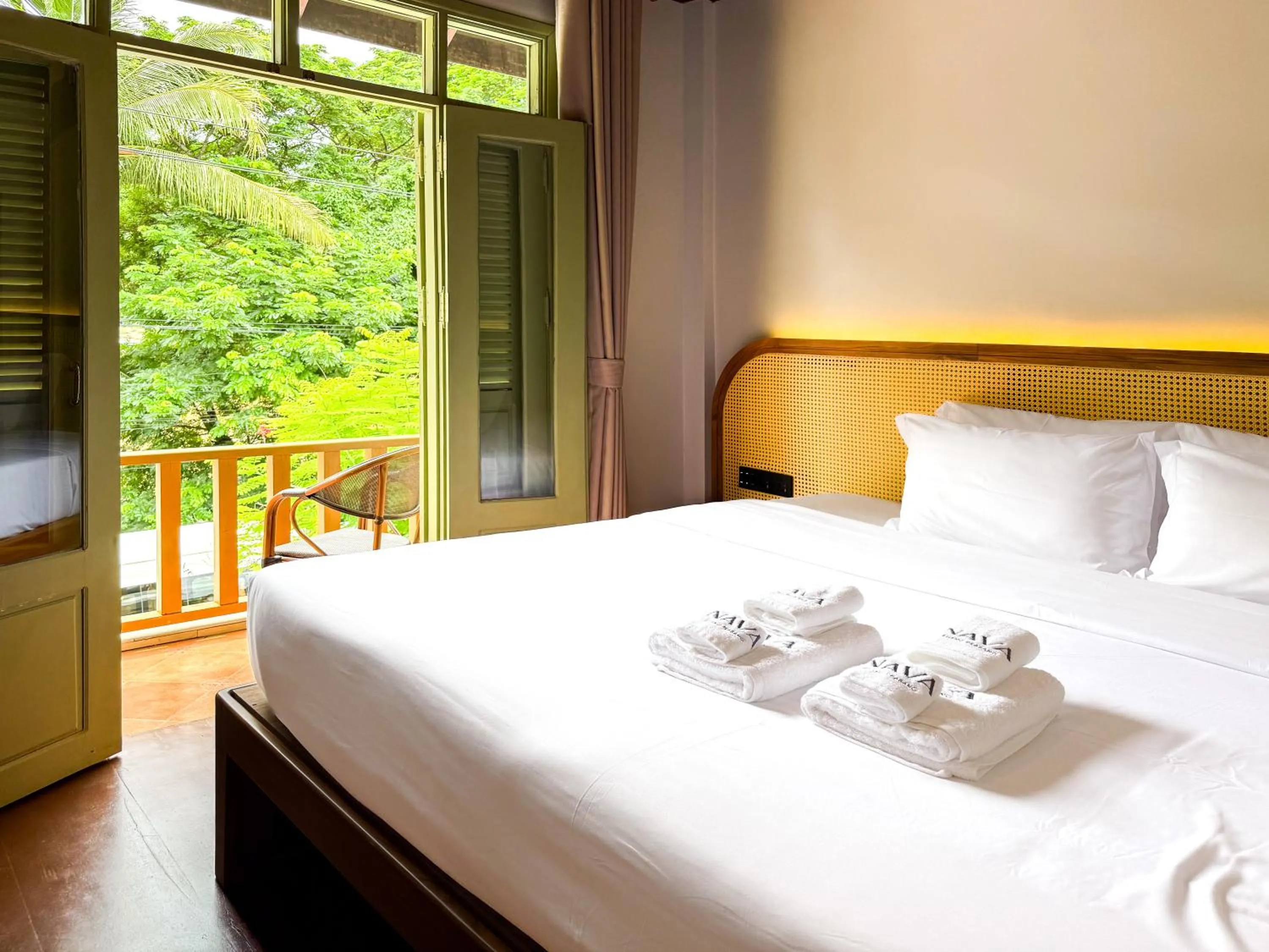 Bed in Nava Luang Prabang Hotel