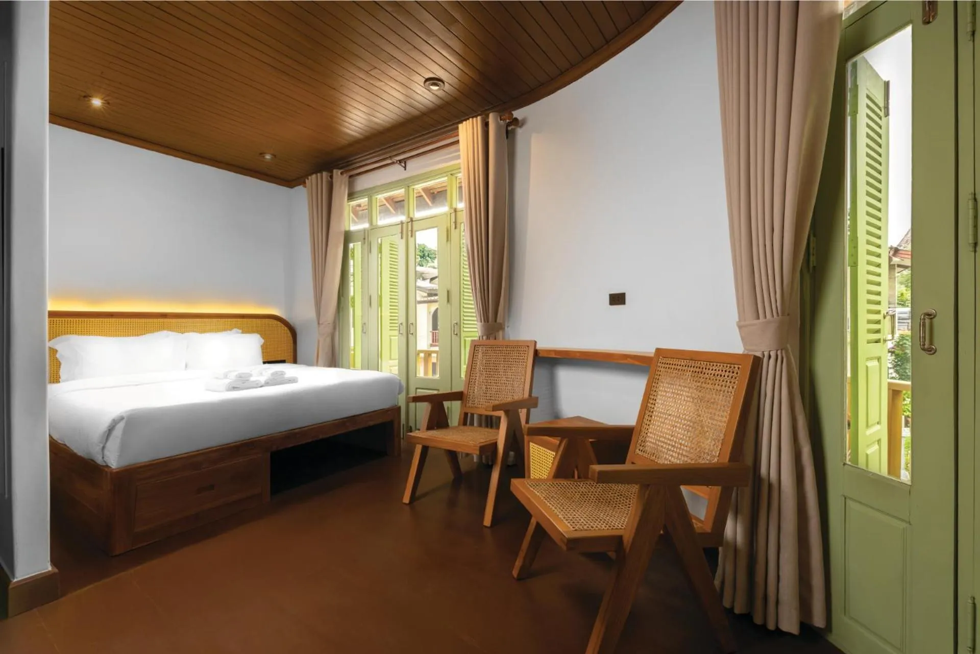 Living room, Bed in Nava Luang Prabang Hotel