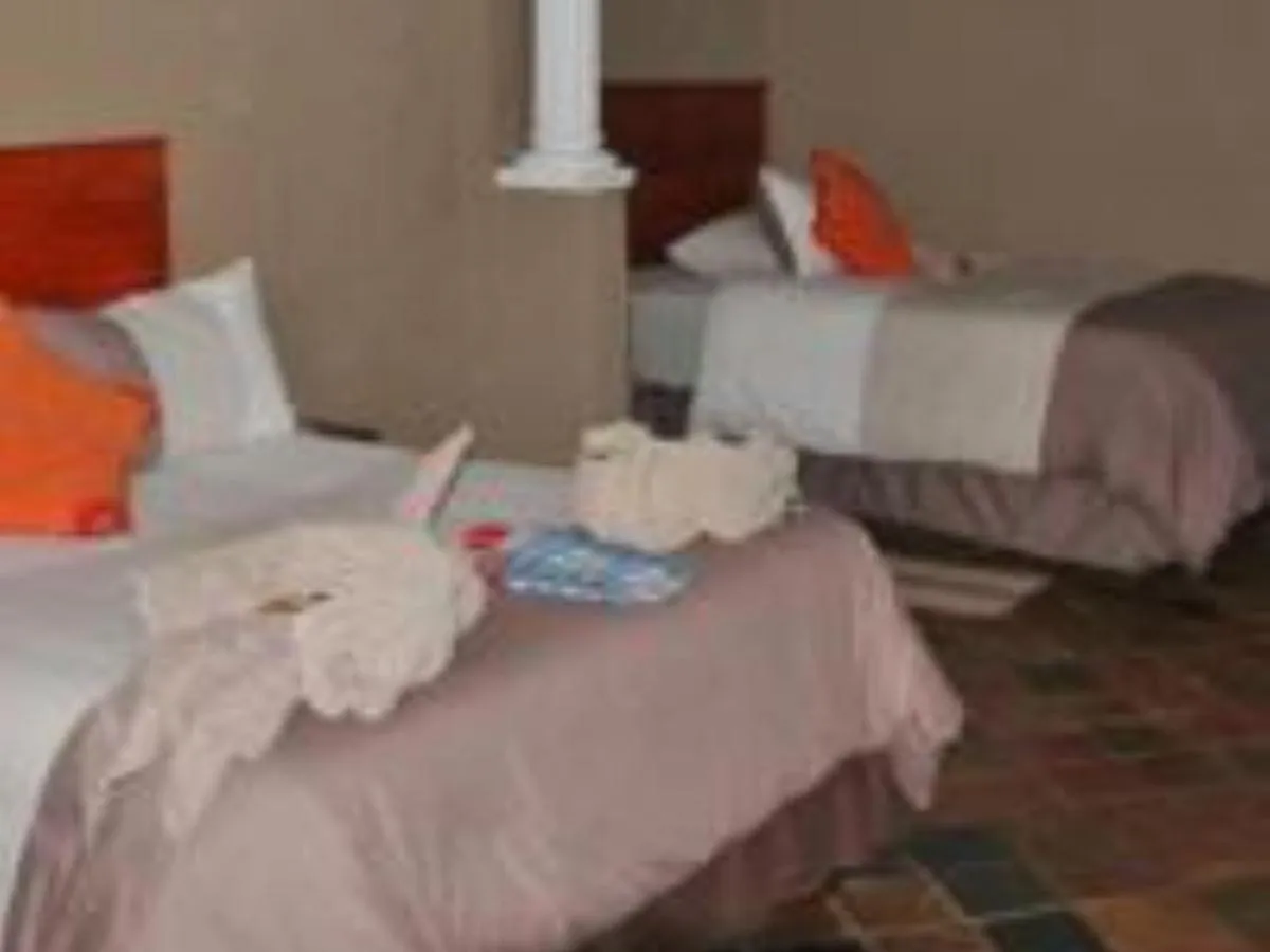 Photo of the whole room, Bed in Emahlathini Guest Farm