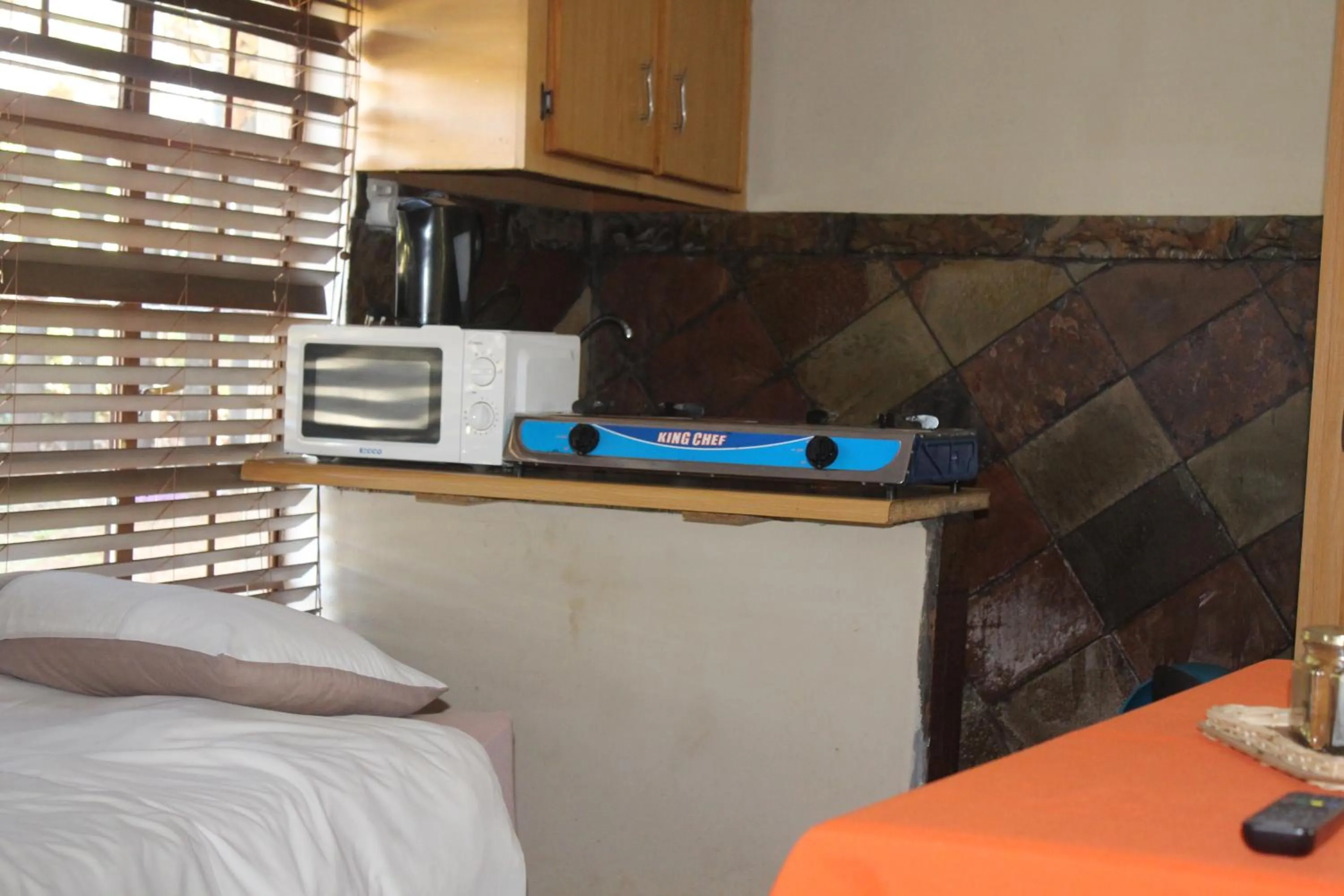 Bed in Emahlathini Guest Farm