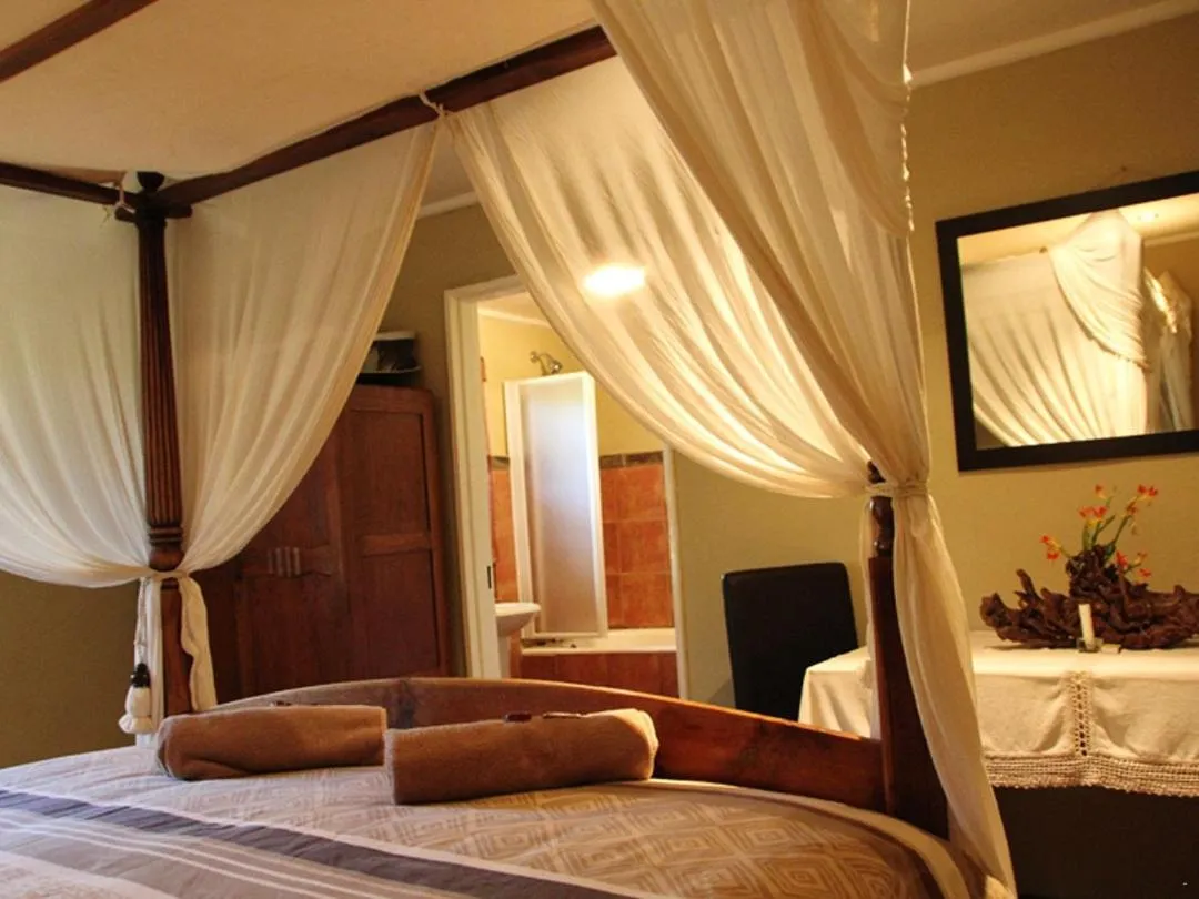 Bed in Emahlathini Guest Farm