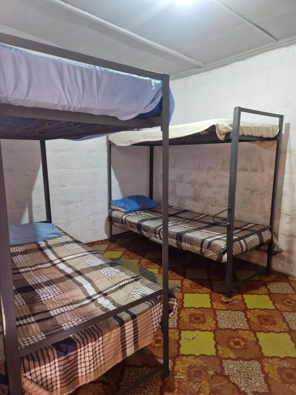 Bed in Emahlathini Guest Farm