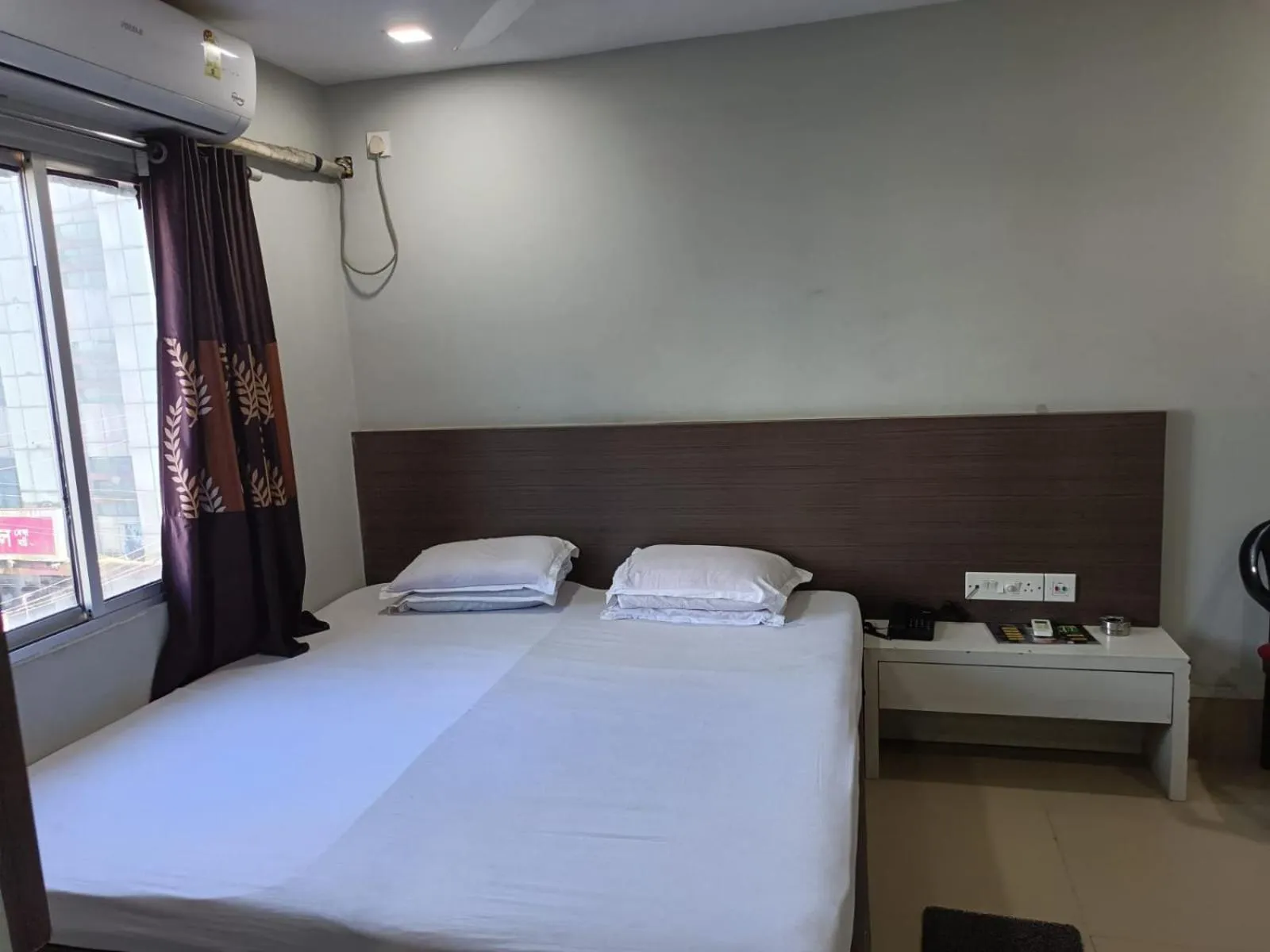 Bed in Kusum Hotel