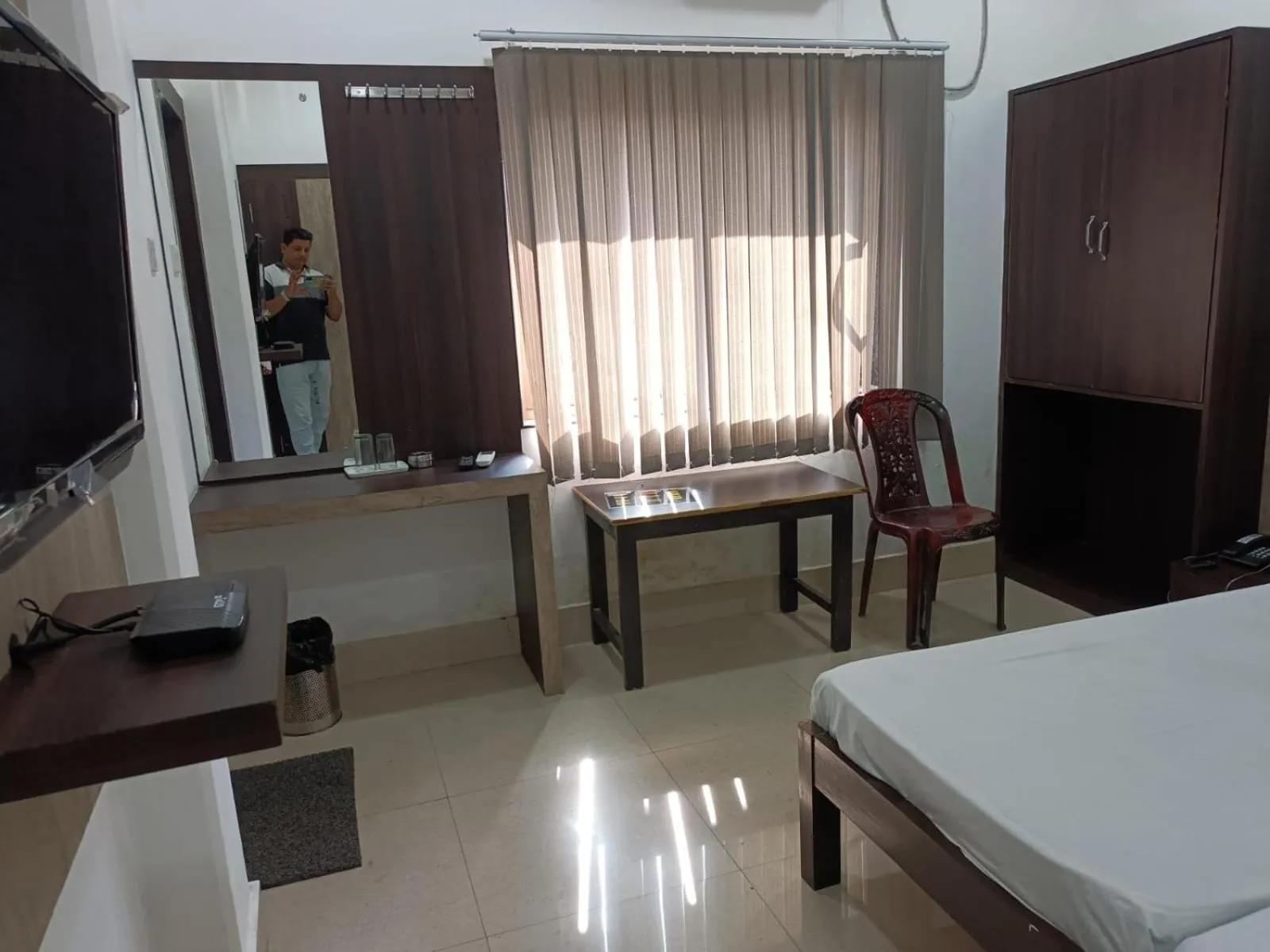 Communal lounge/ TV room, Bed in Kusum Hotel