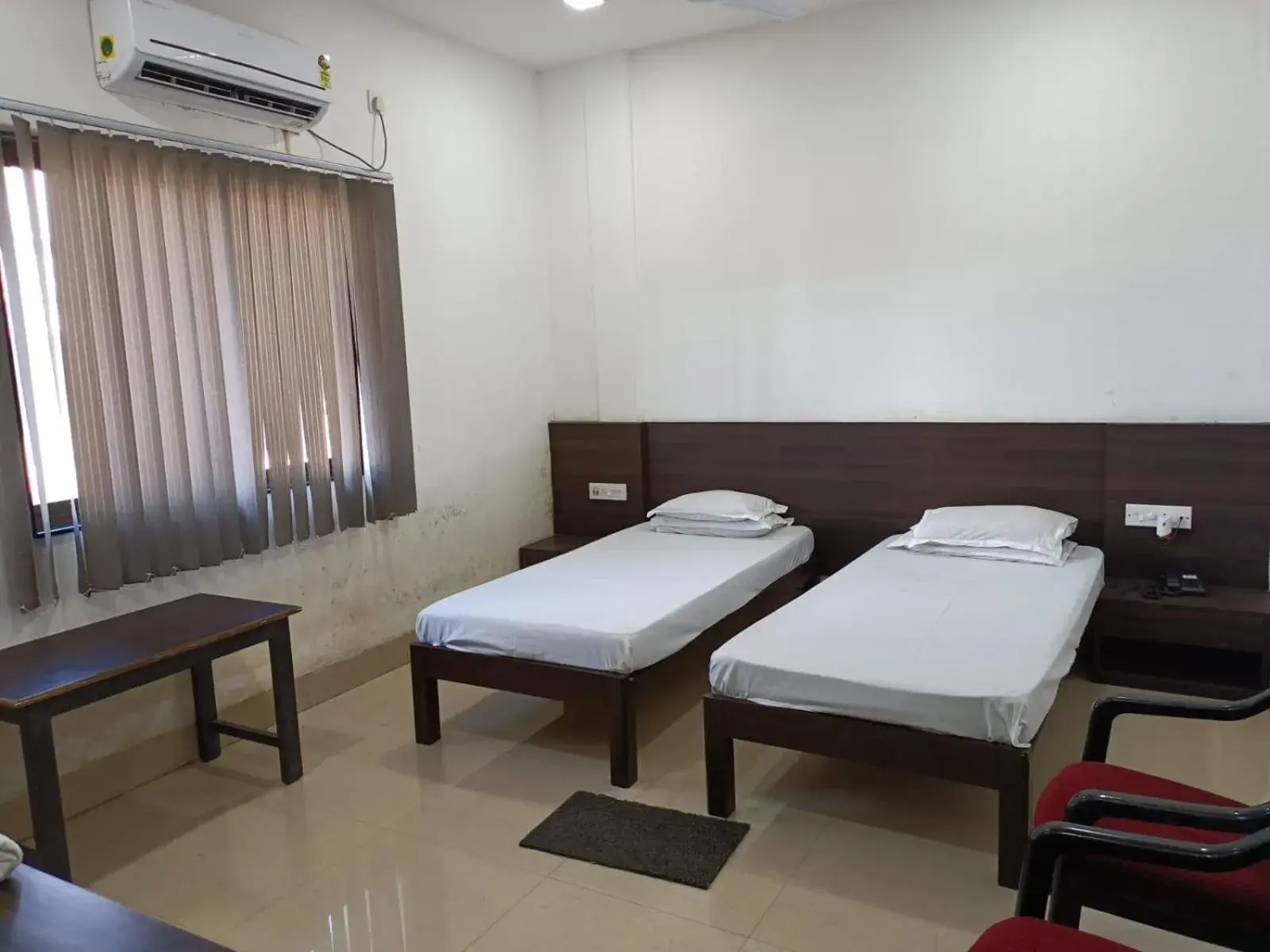 Bed in Kusum Hotel Bed in Kusum Hotel