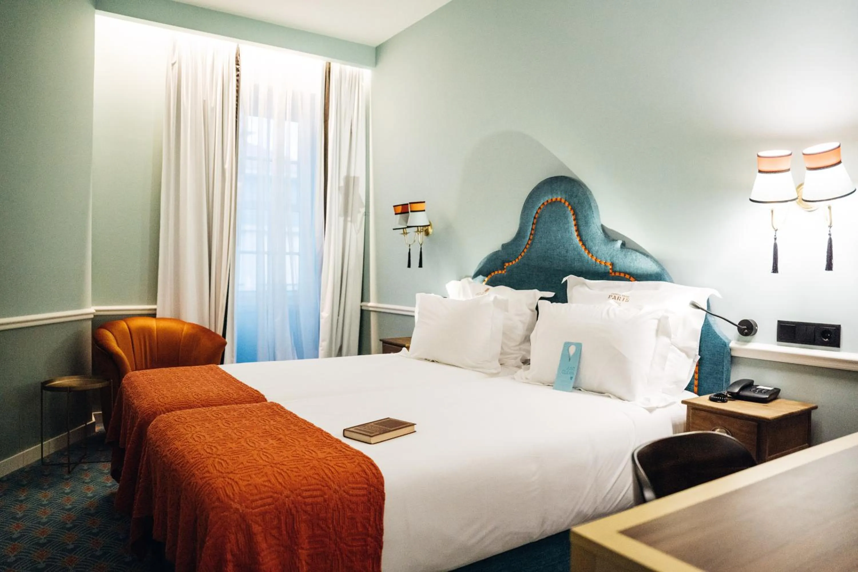 Bed in GRANDE HOTEL PARIS by STAY HOTELS