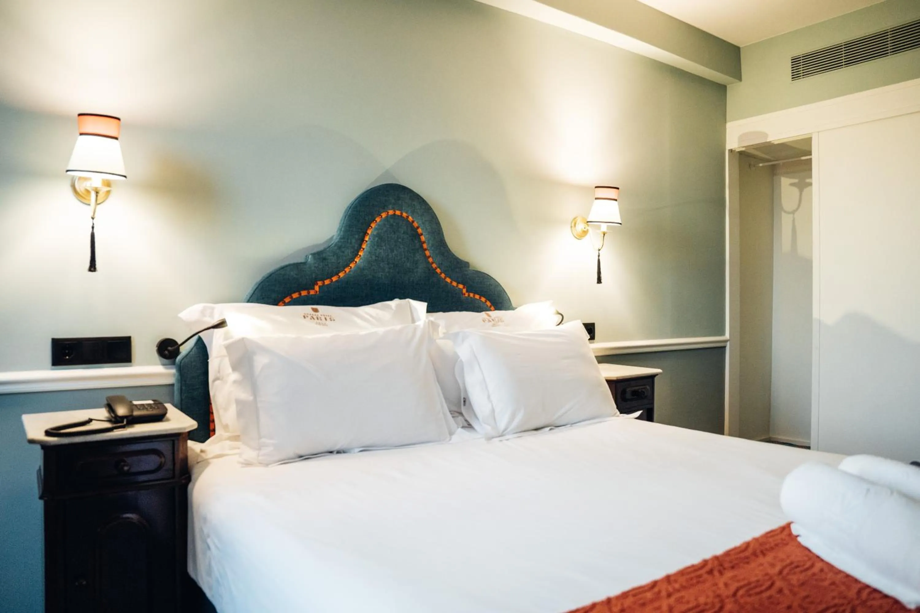 Bed in GRANDE HOTEL PARIS by STAY HOTELS
