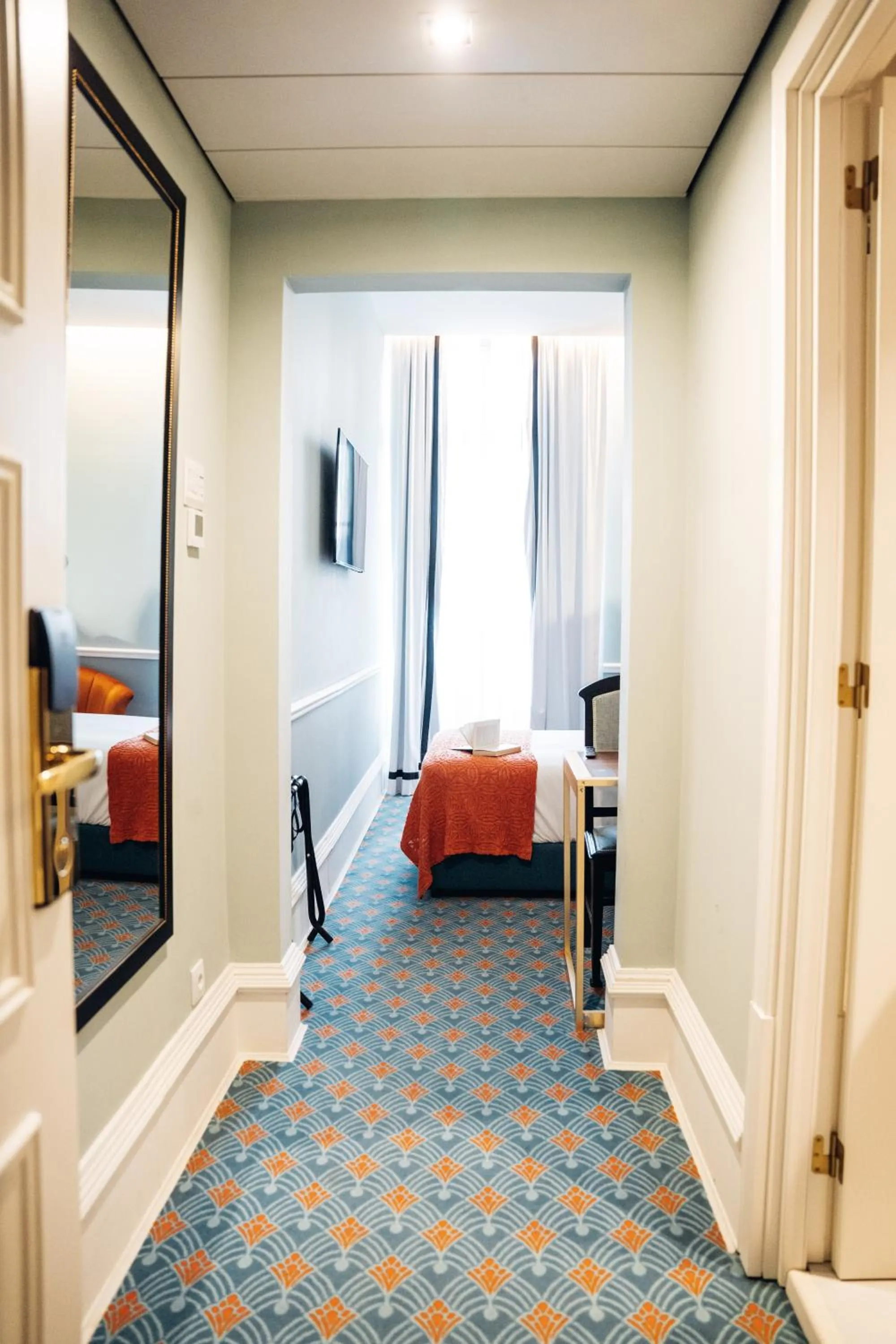 Bed in GRANDE HOTEL PARIS by STAY HOTELS