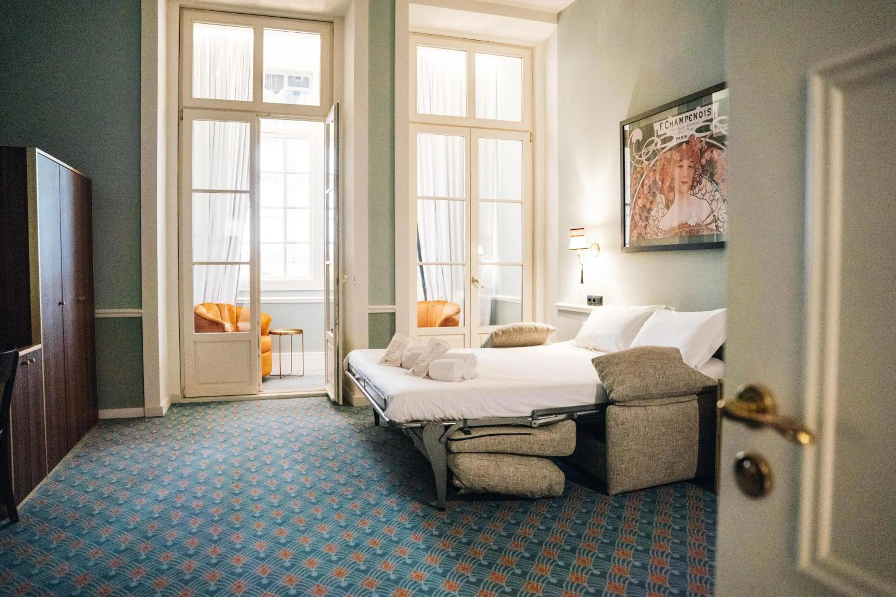 Bed in GRANDE HOTEL PARIS by STAY HOTELS