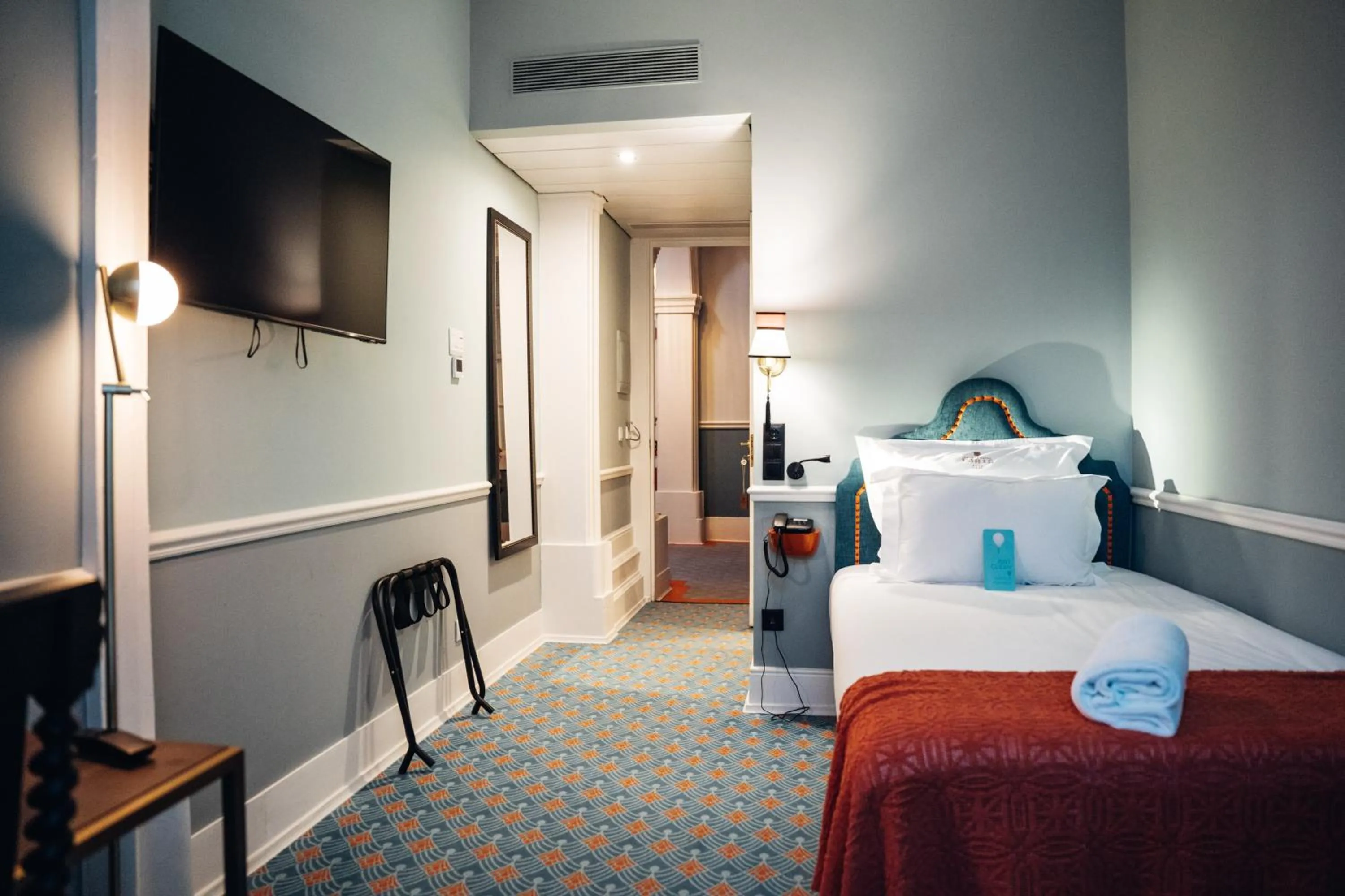 Bed in GRANDE HOTEL PARIS by STAY HOTELS