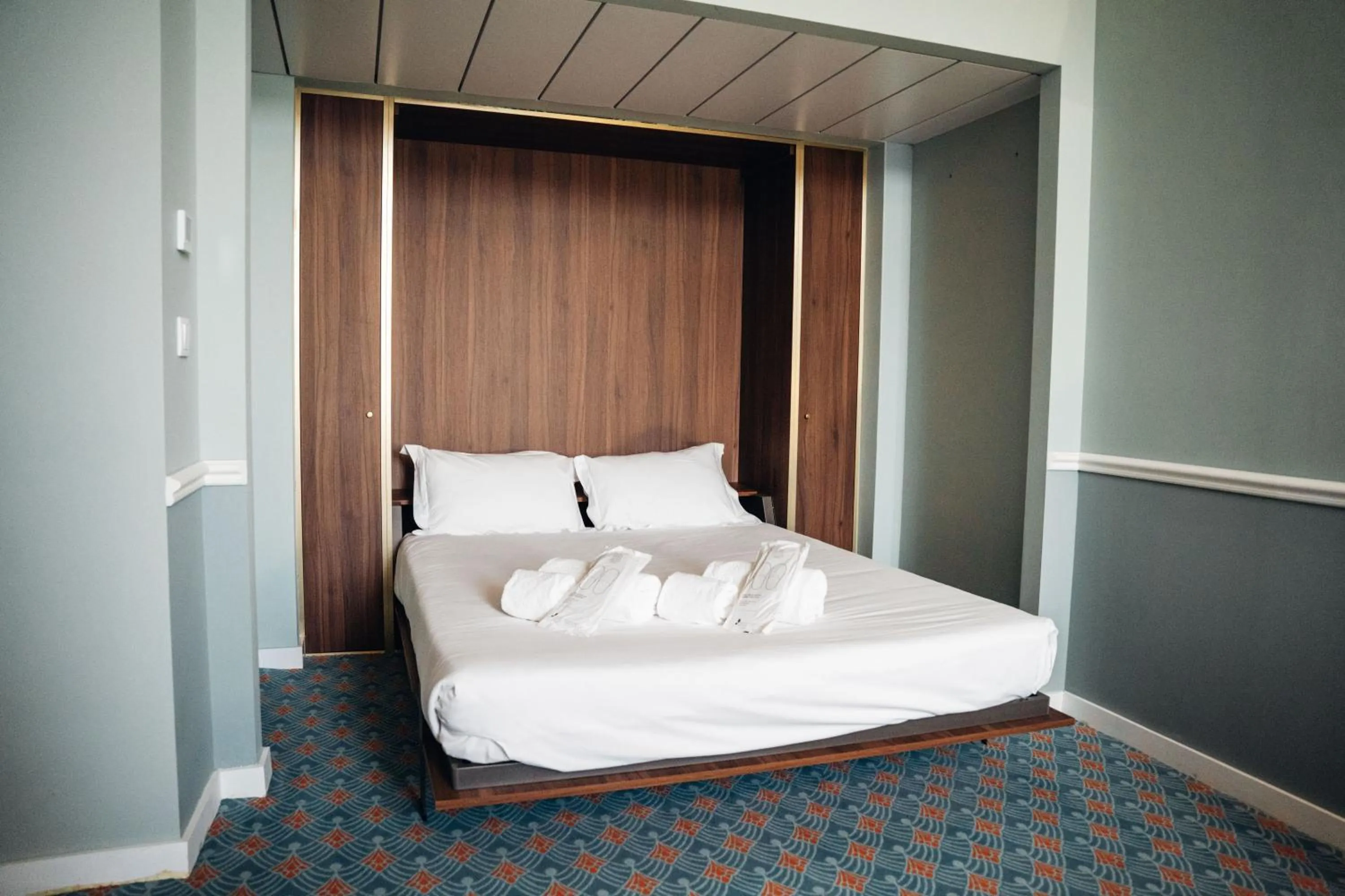 Bed in GRANDE HOTEL PARIS by STAY HOTELS