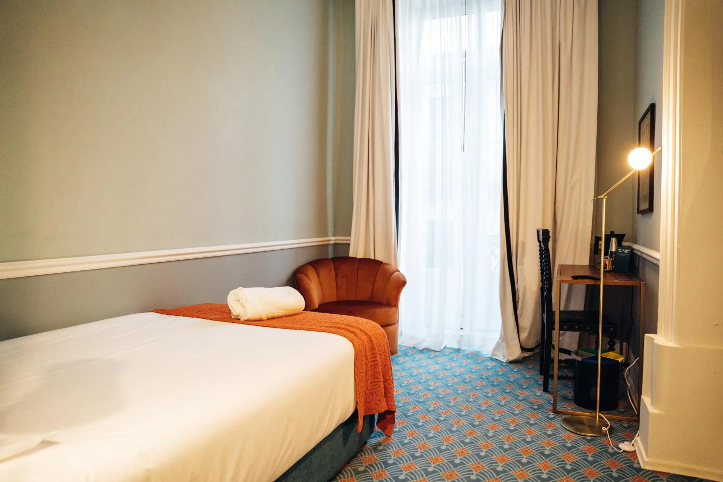Bed in GRANDE HOTEL PARIS by STAY HOTELS