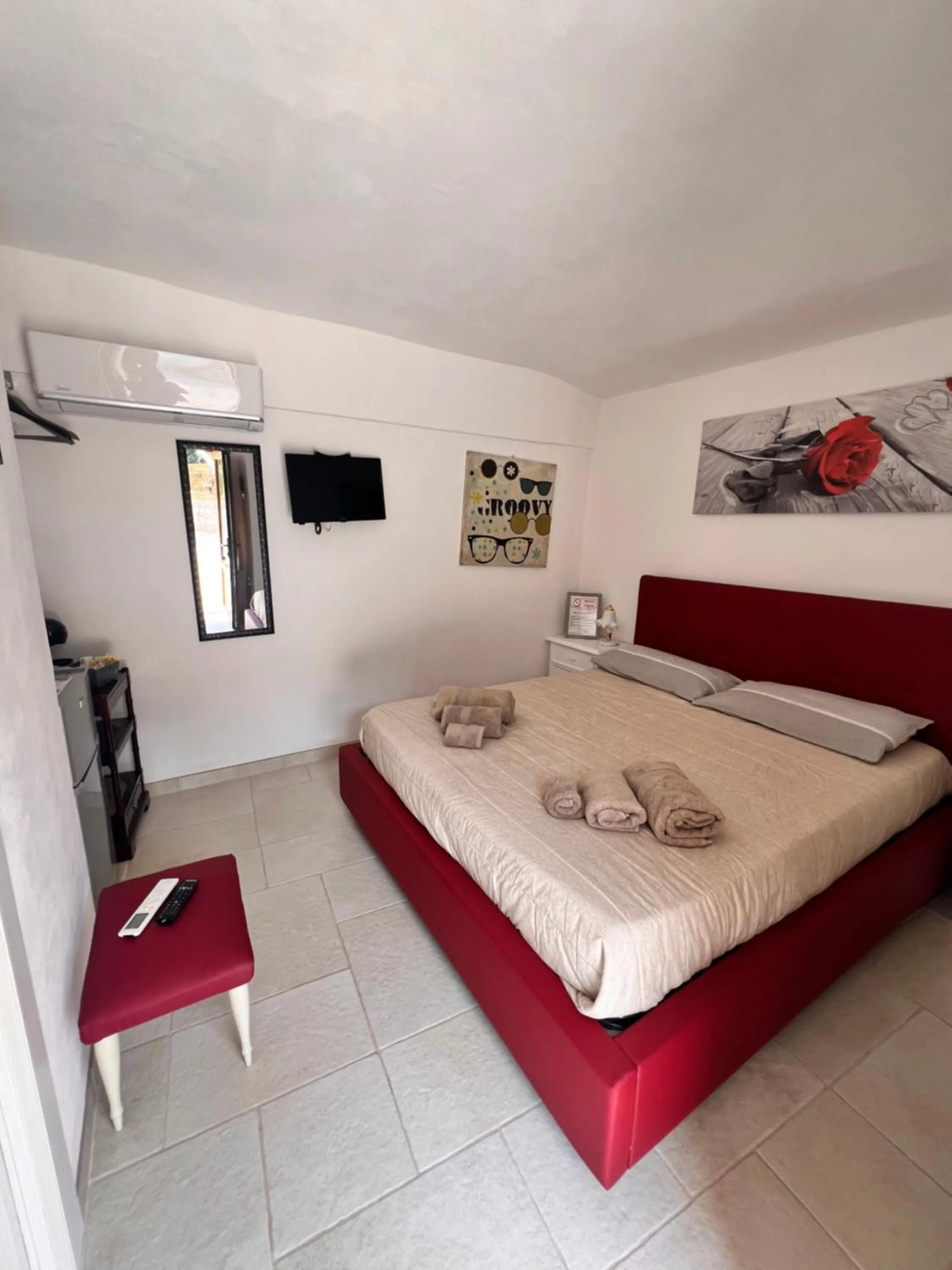 Photo of the whole room, Bed in Locazione turistica il boschetto