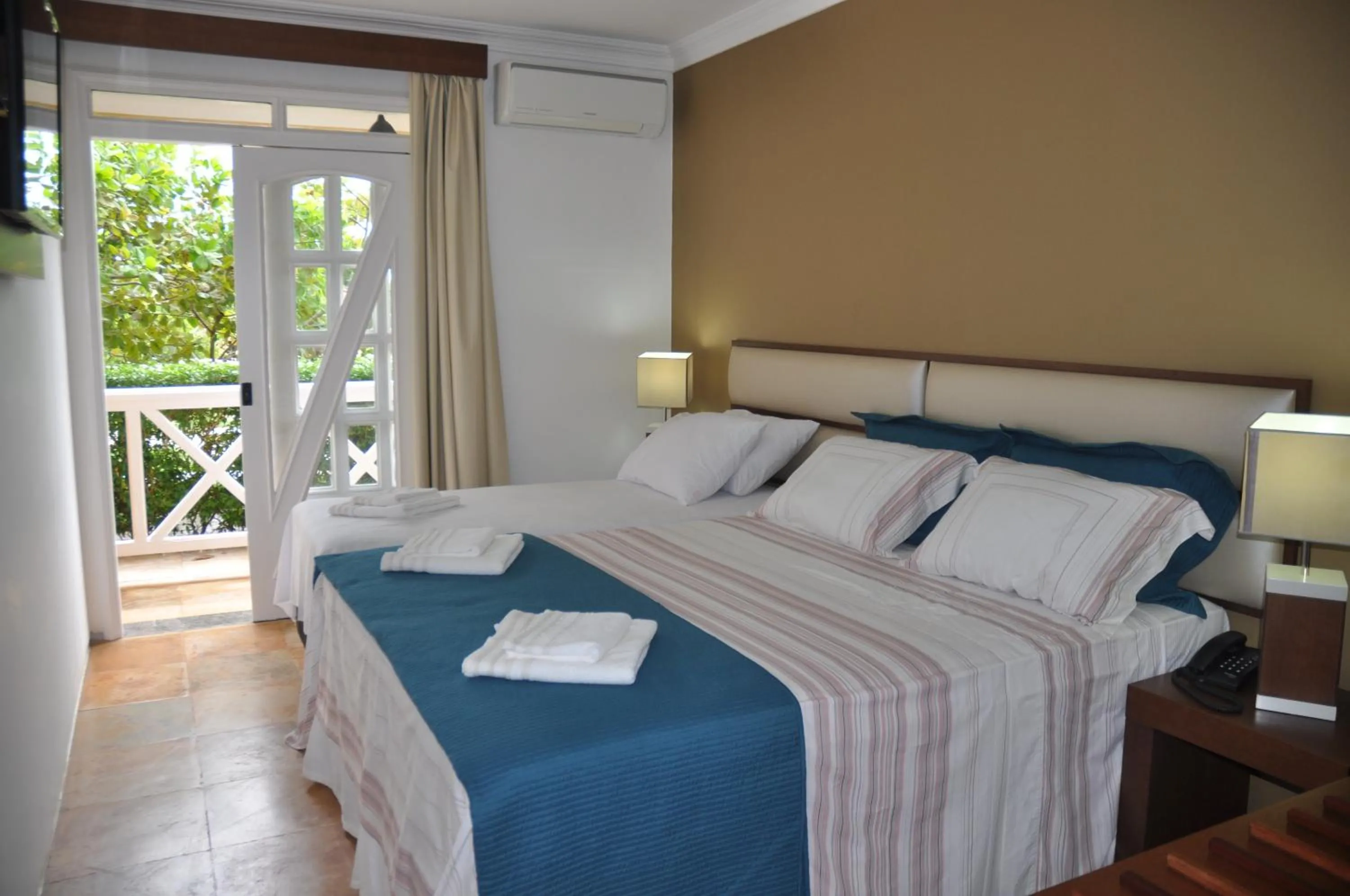 Luxury Triple Room in Hotel Porto Belo