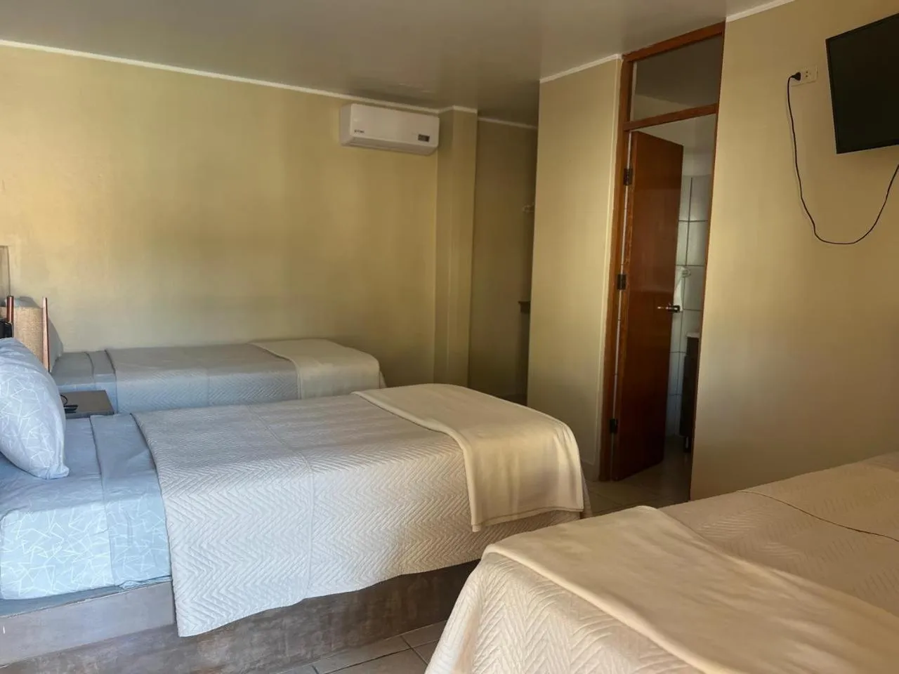 Bed in Hotel El Huacachinero- Hotel Familiar