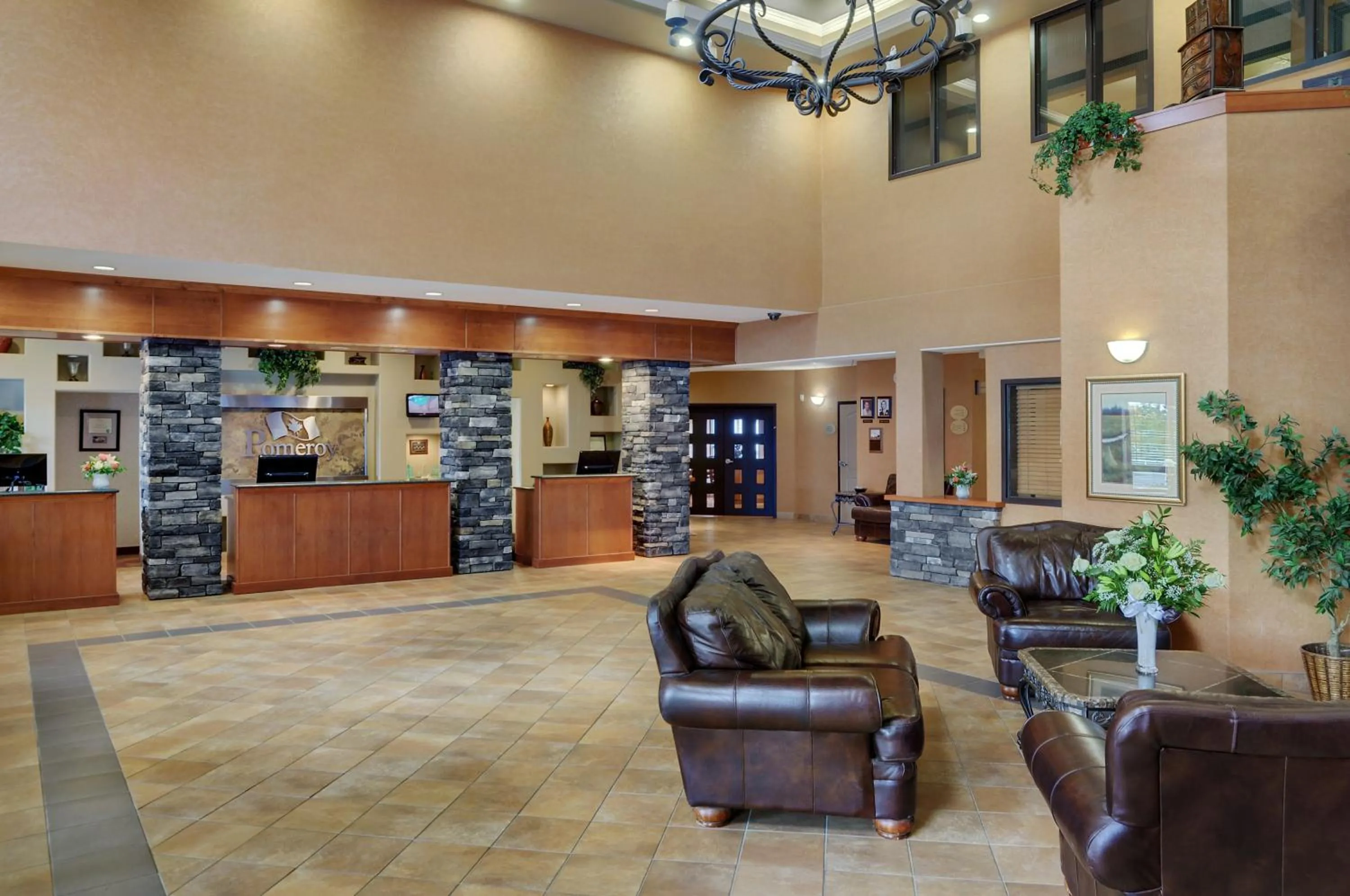 Lobby or reception in Pomeroy Inn and Suites Dawson Creek